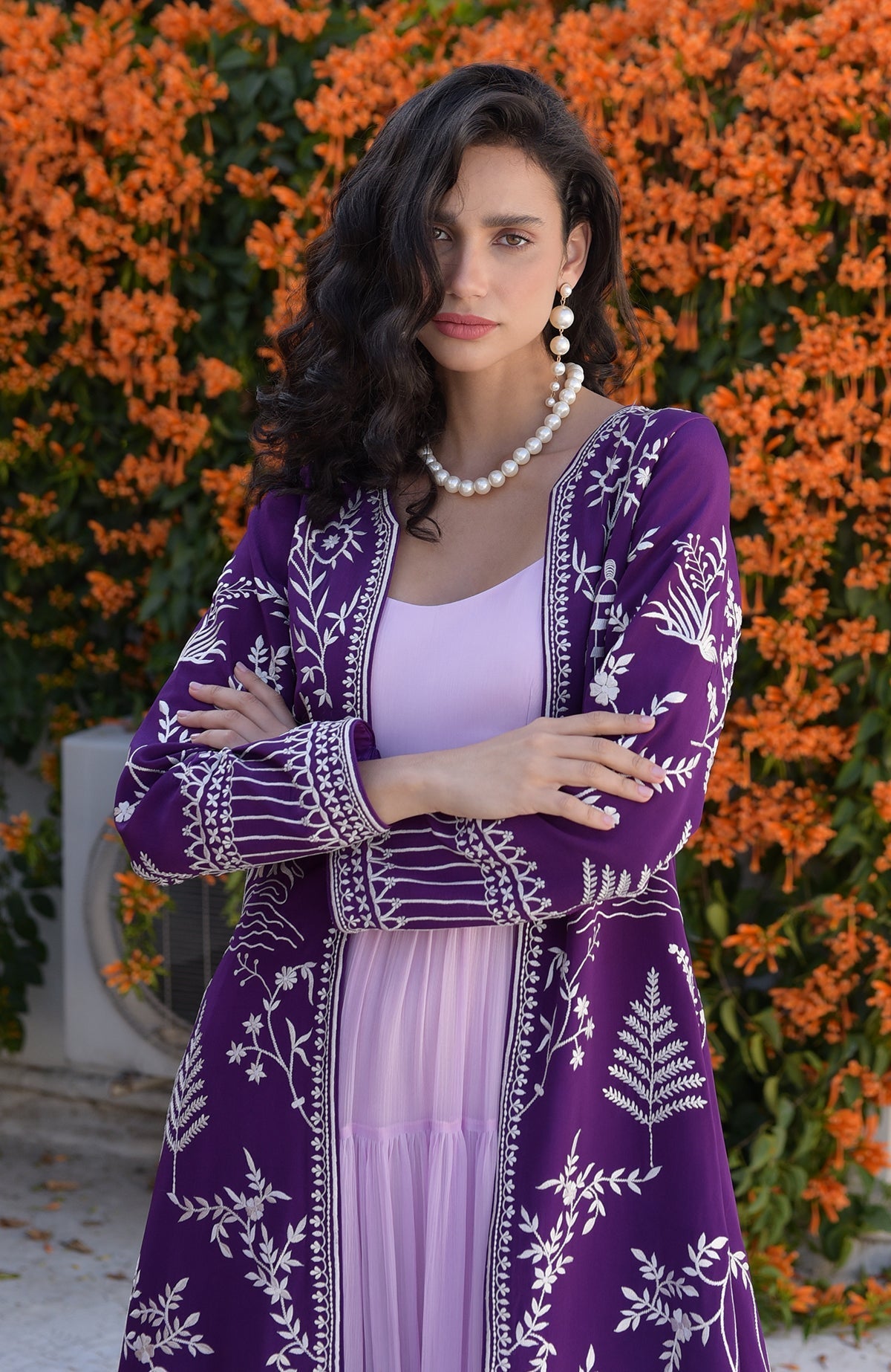 Emerald green jacket with ivory Parsi Gara embroidery and detailed borders on hems and sleeves