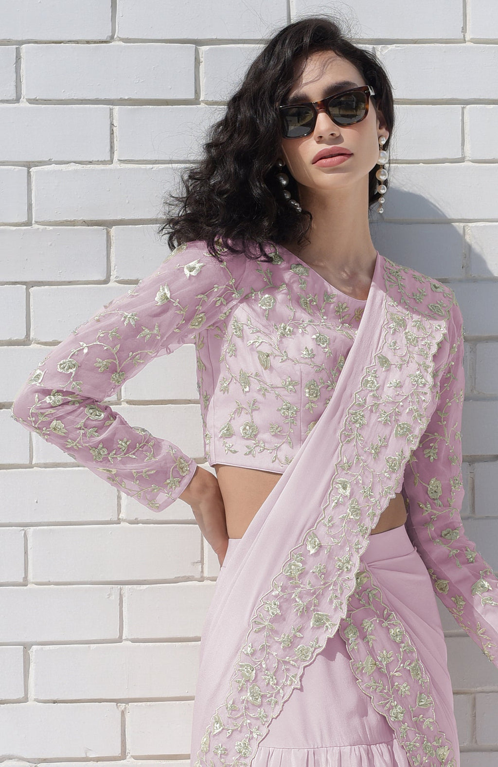 Lilac draped saree set with silver floral embroidery and long sleeves.