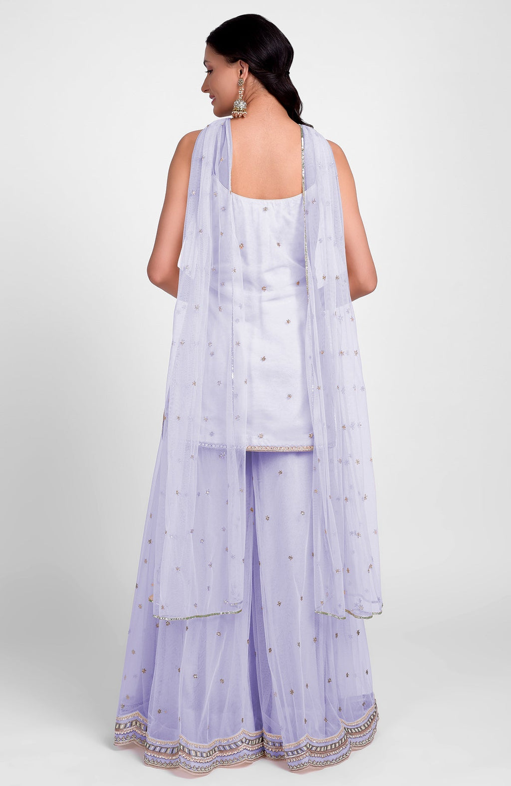 Lilac sharara set with bead sequins, hand embroidery, flared kurta, and jeweled tulle dupatta.
