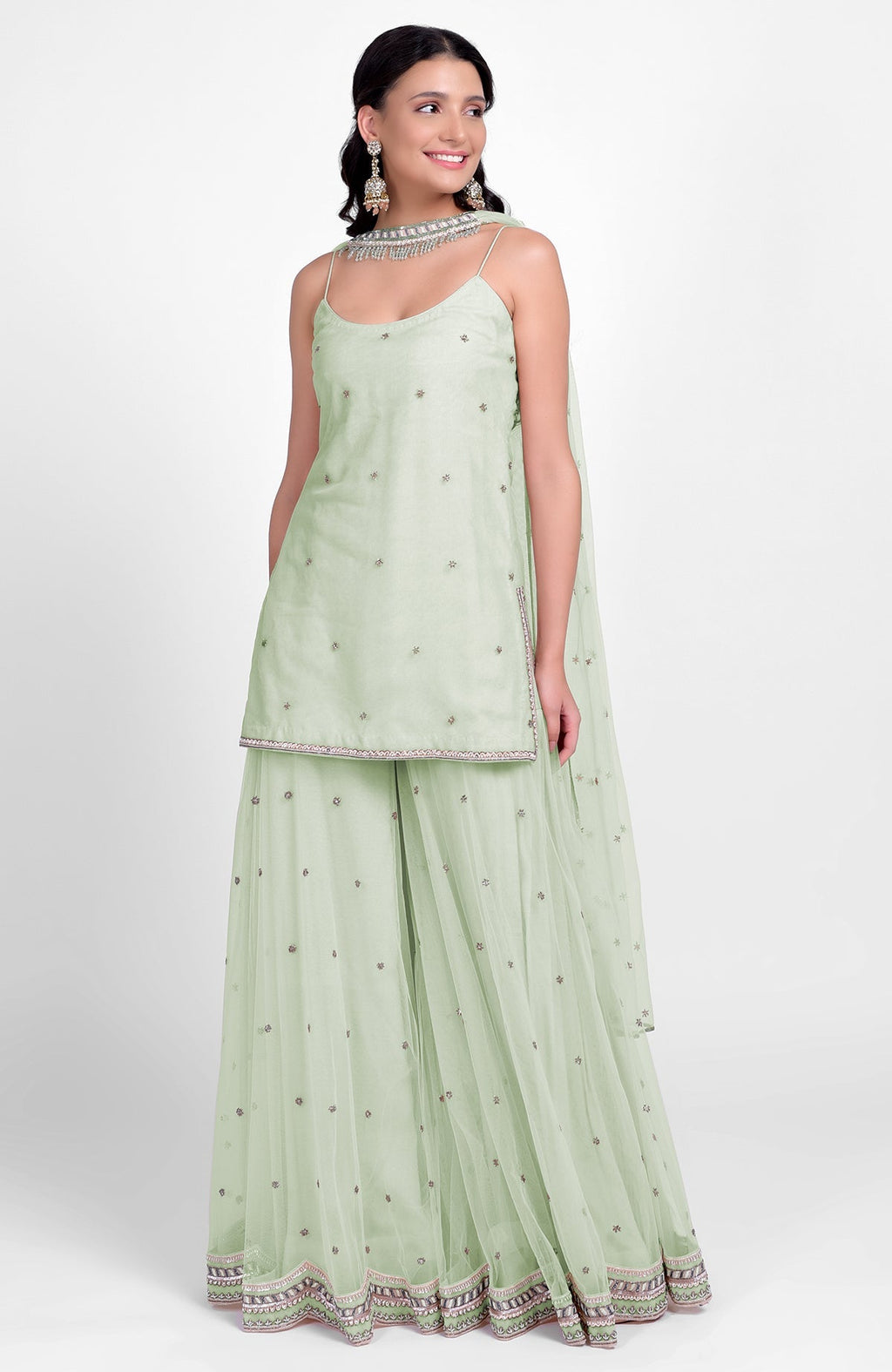 Sage green sharara set with bead sequins, hand embroidery, and tulle dupatta with jeweled choker.