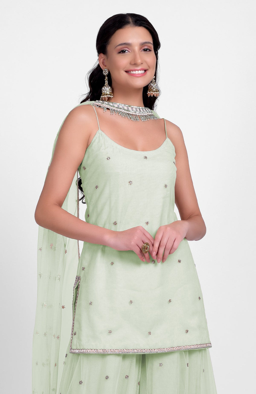 Sage green sharara set with bead sequins, hand embroidery, and a jeweled tulle dupatta.