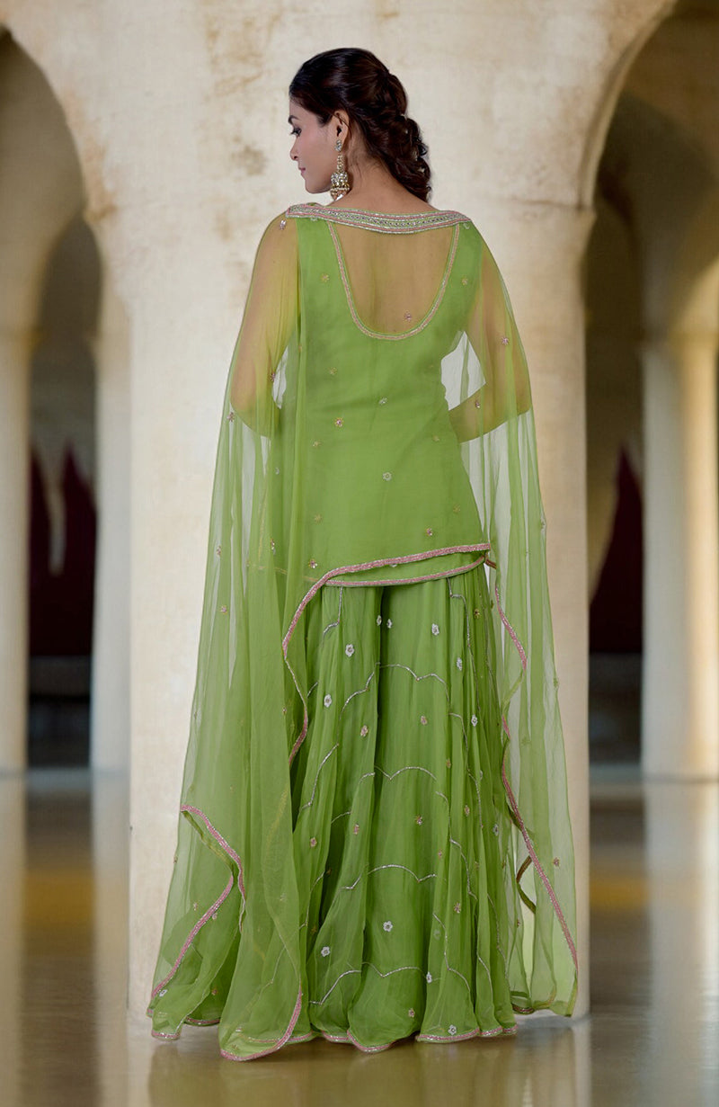 Lime green hand-embroidered sharara cape set with a scoop neck and circular cut sharara.