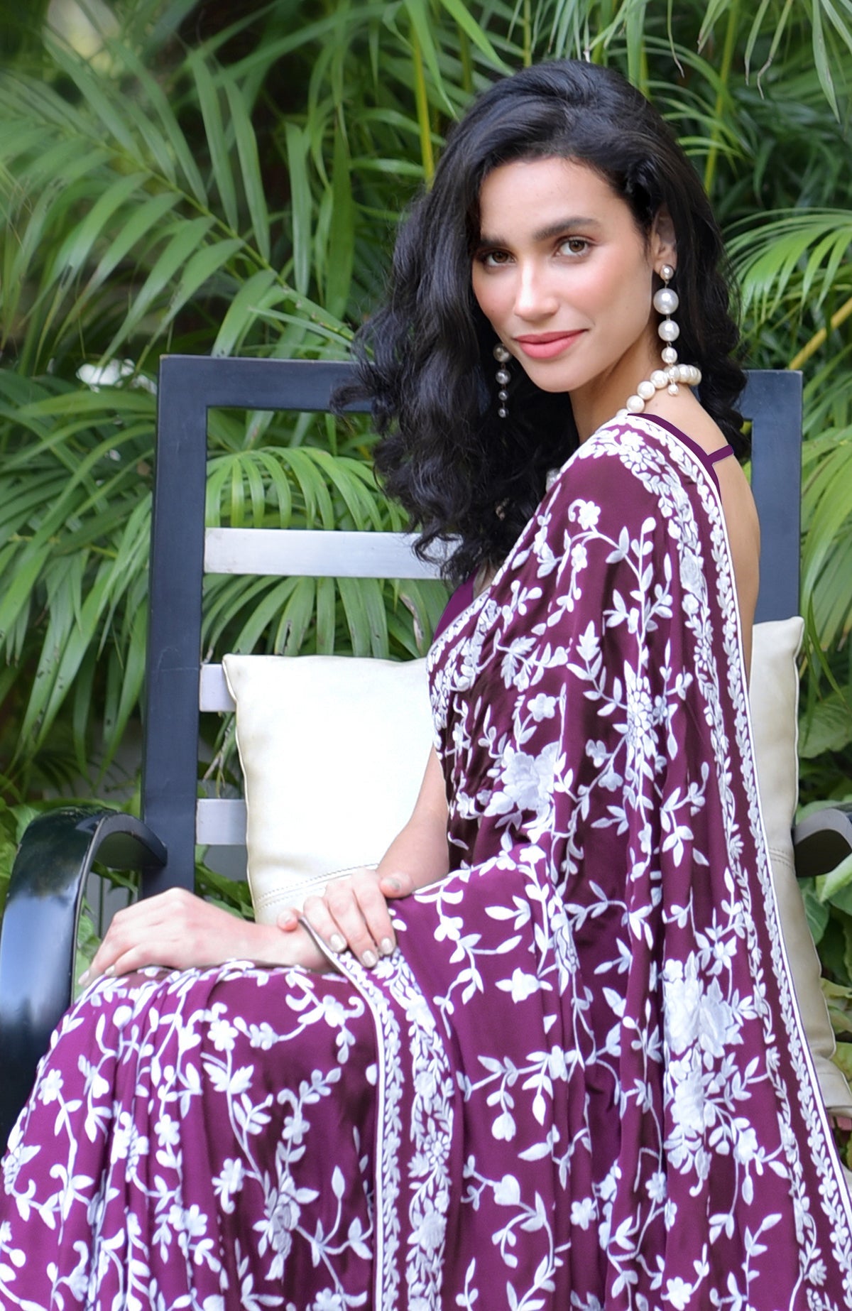 Purple saree with hand-embroidered white floral Parsi Gara design and matching blouse piece.