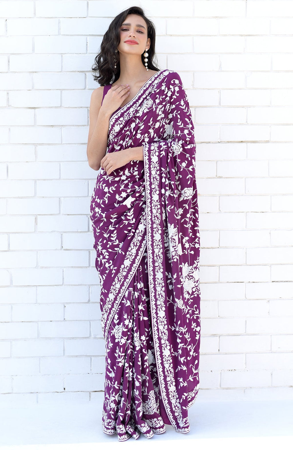 Purple saree with hand-embroidered white Parsi Gara floral borders and matching blouse piece.