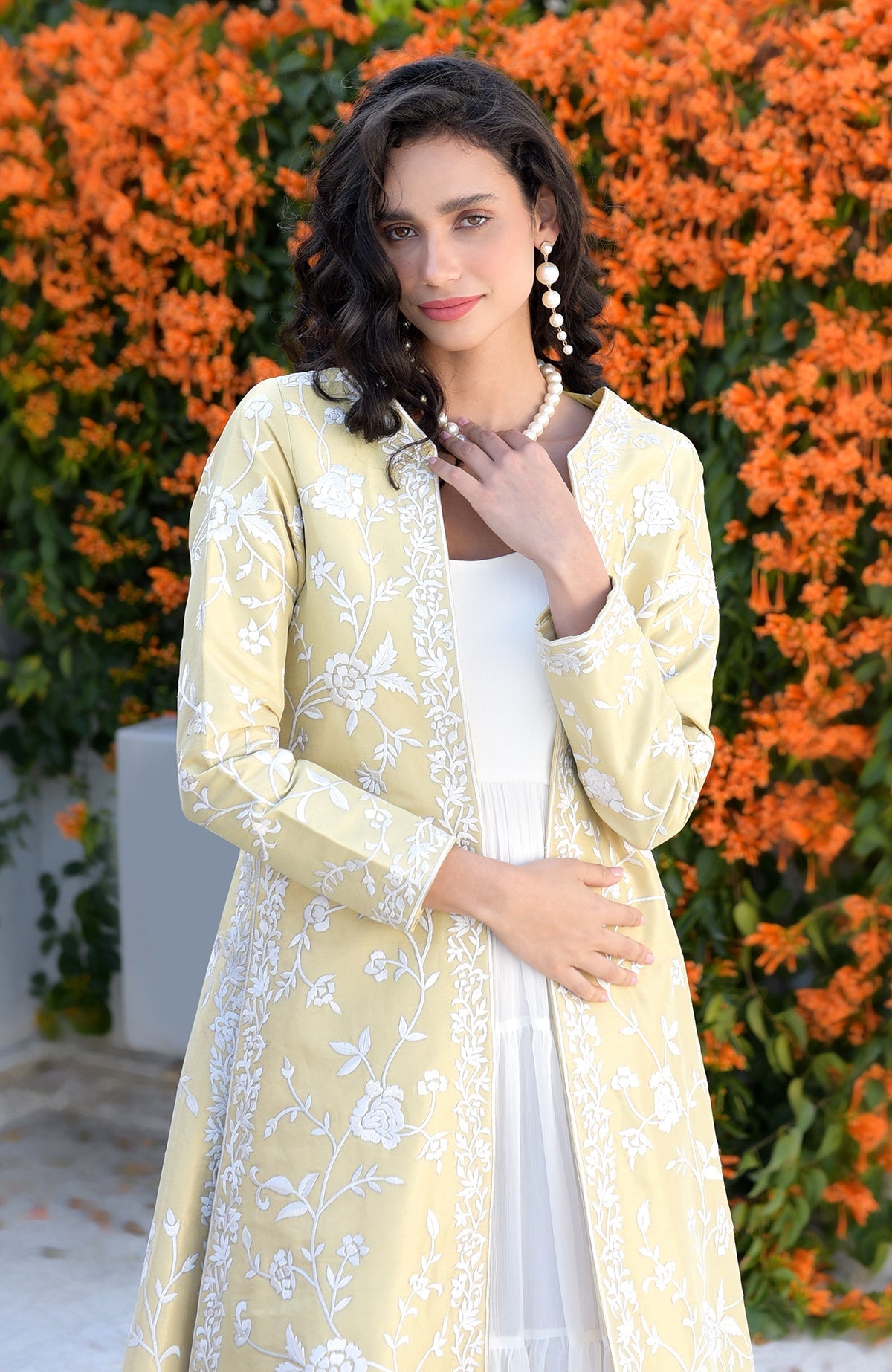 Gold jacket with ivory floral Parsi Gara embroidery and detailed borders on hems and sleeves