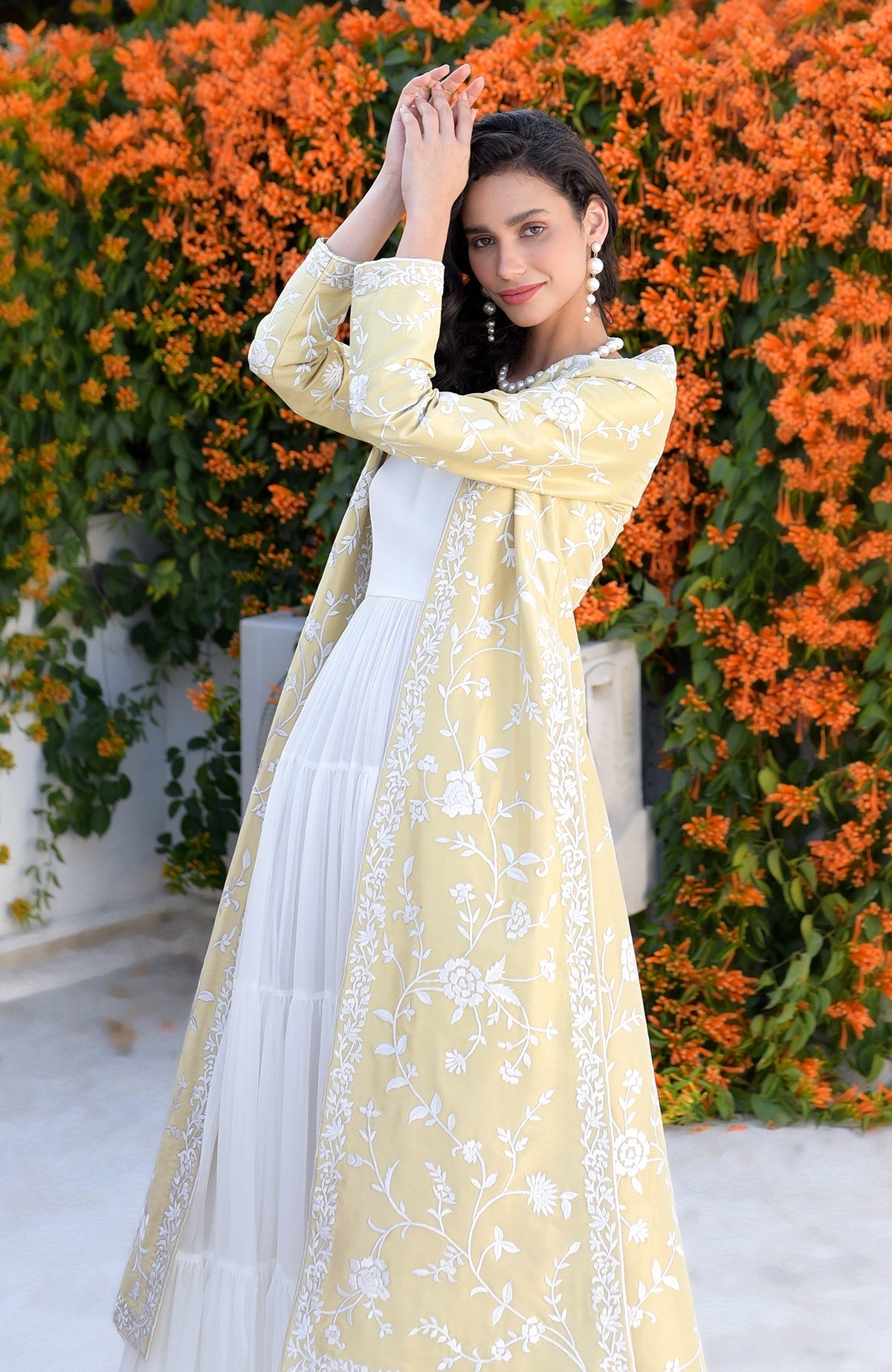 Gold jacket with ivory floral Parsi Gara embroidery and detailed borders on hems and sleeves