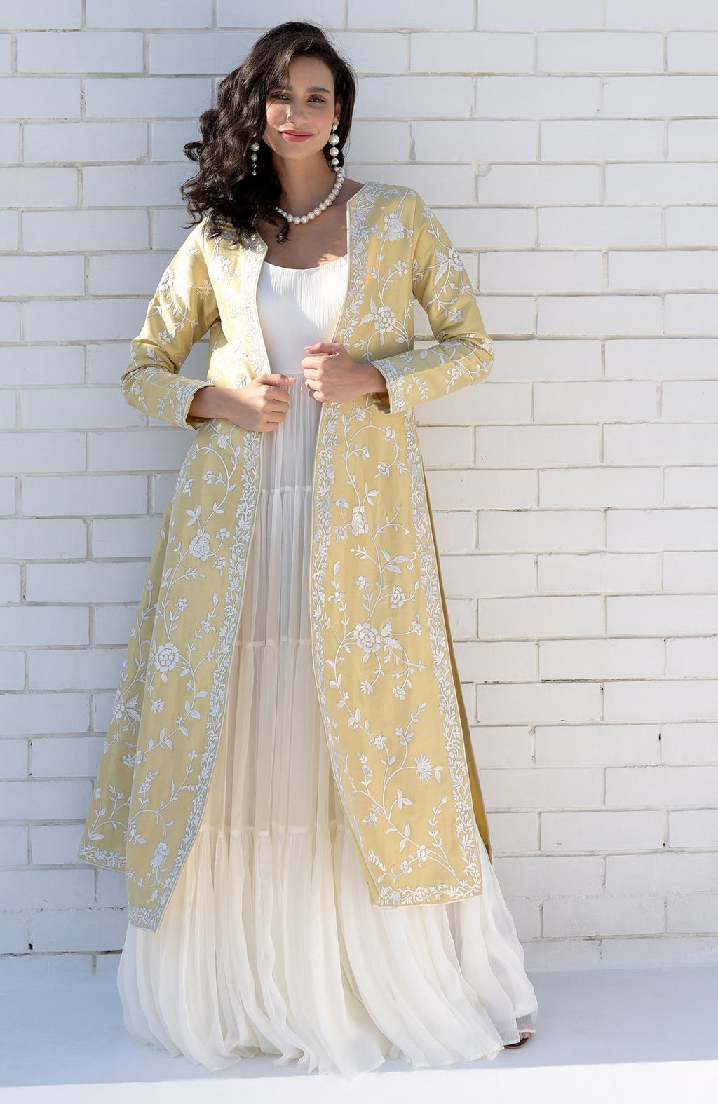 Gold jacket with ivory floral Parsi Gara embroidery and detailed borders on hems and sleeves