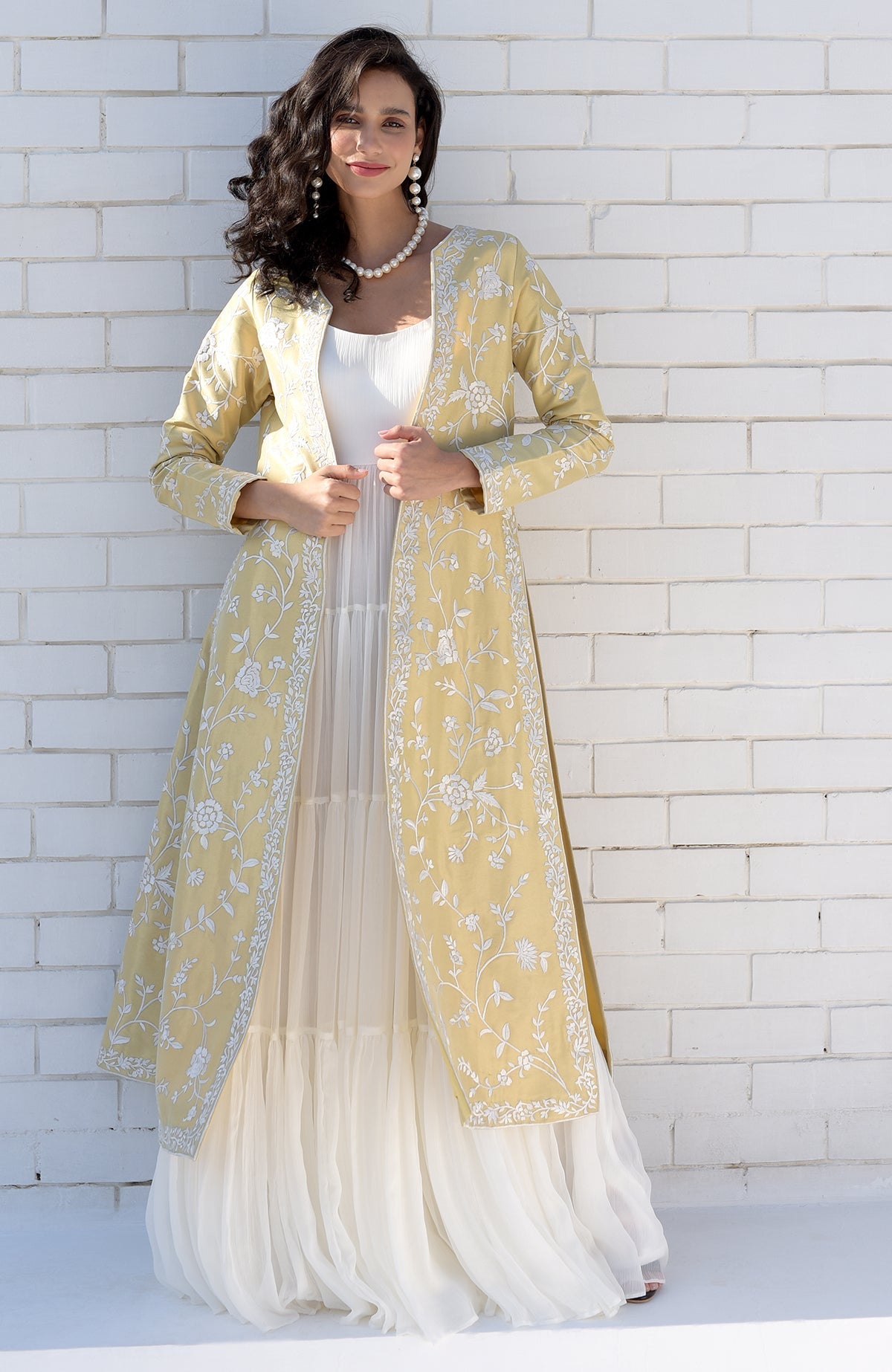 Gold jacket with ivory floral Parsi Gara embroidery and detailed borders on hems and sleeves