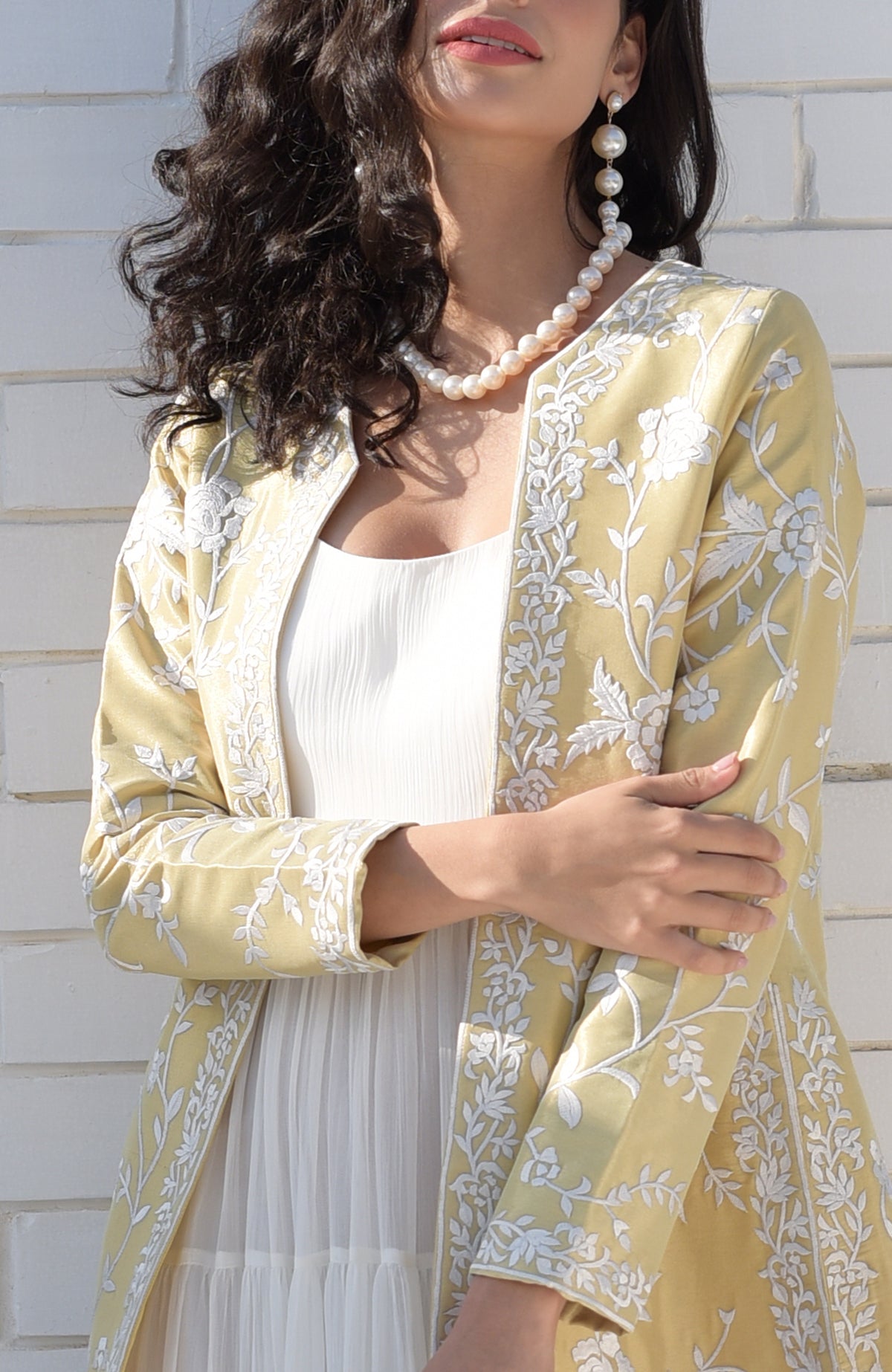 Gold jacket with ivory floral Parsi Gara embroidery and detailed borders on hems and sleeves