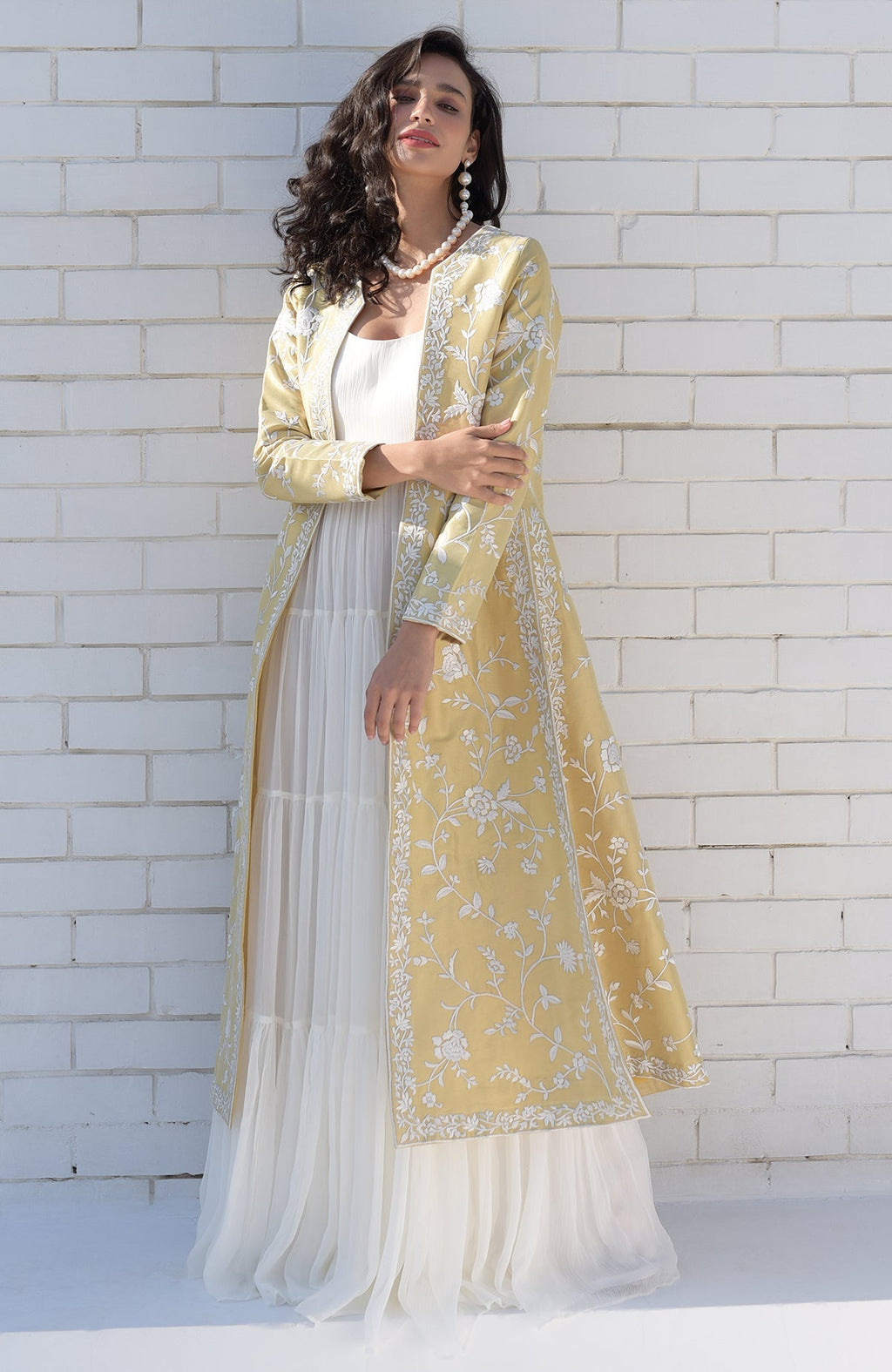 Gold jacket with ivory floral Parsi Gara embroidery and detailed borders on hems and sleeves