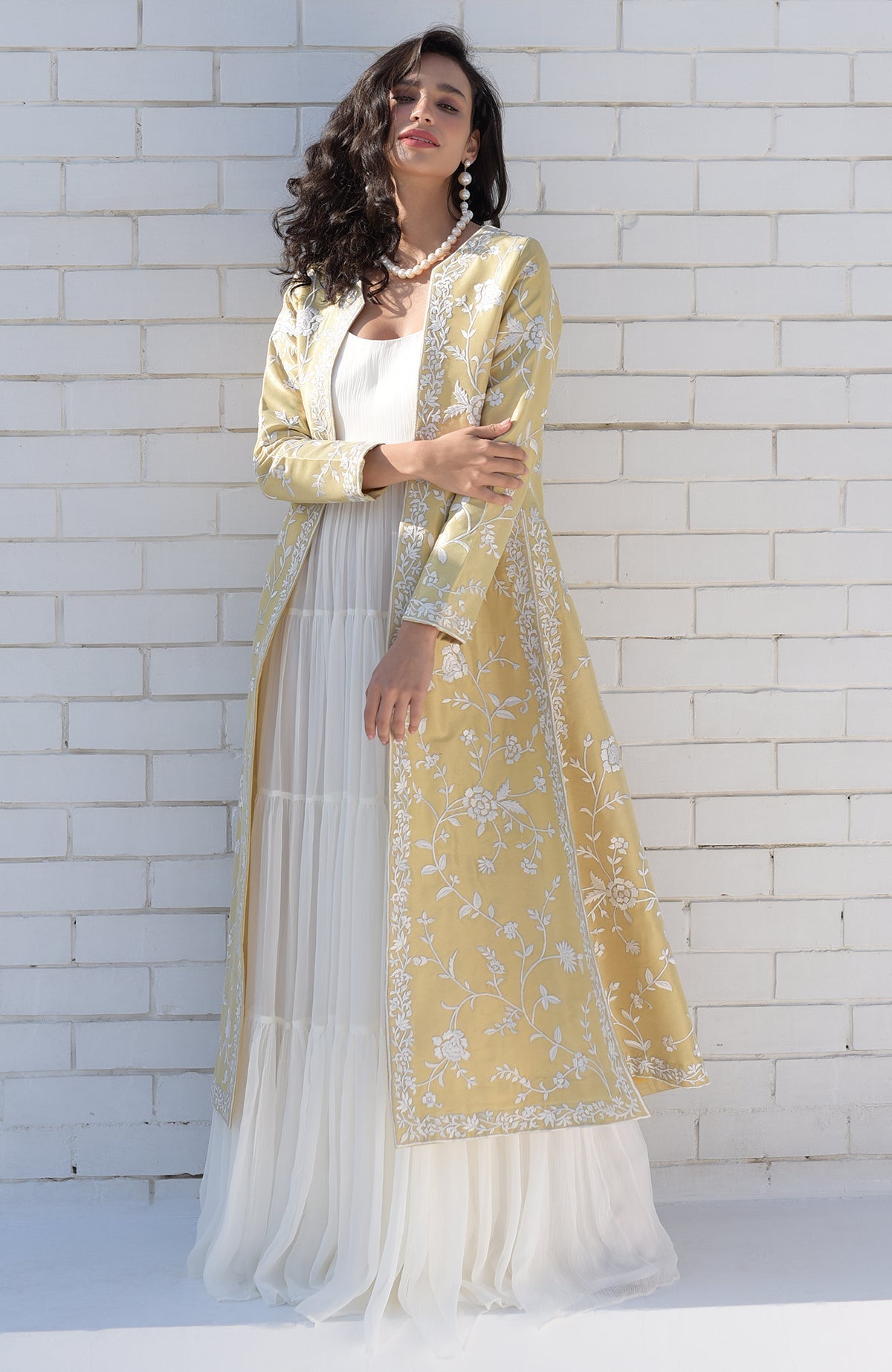 Gold jacket with ivory floral Parsi Gara embroidery and detailed borders on hems and sleeves