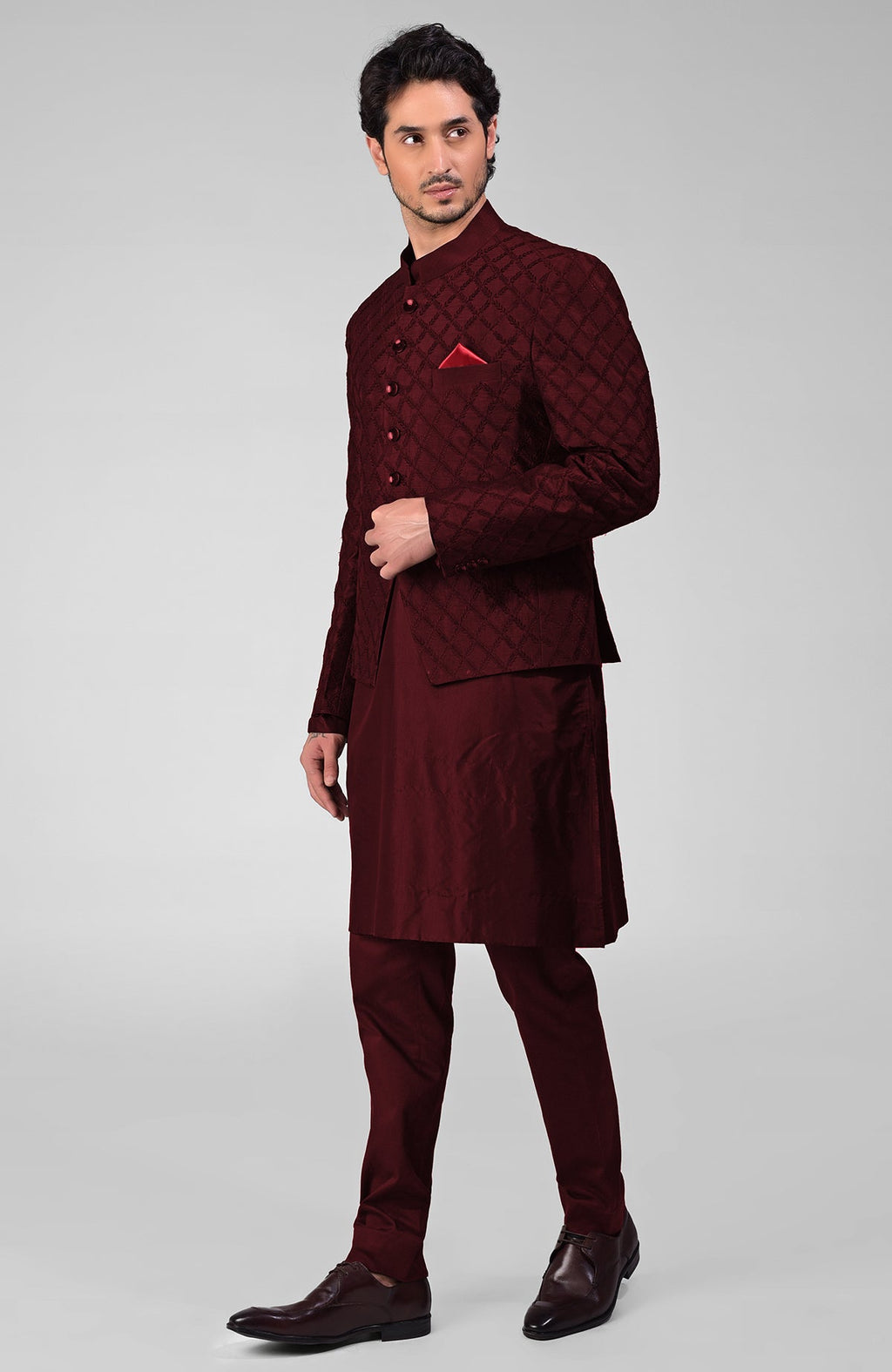 Maroon raw silk Bandhgala jacket with intricate chikankari floral embroidery in a three-piece set