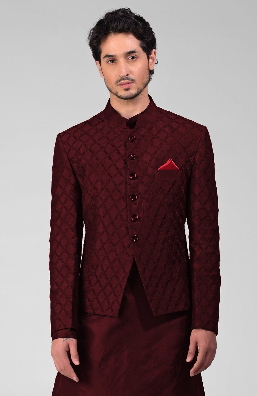 Maroon raw silk bandhgala jacket with geometric floral embroidery all over.