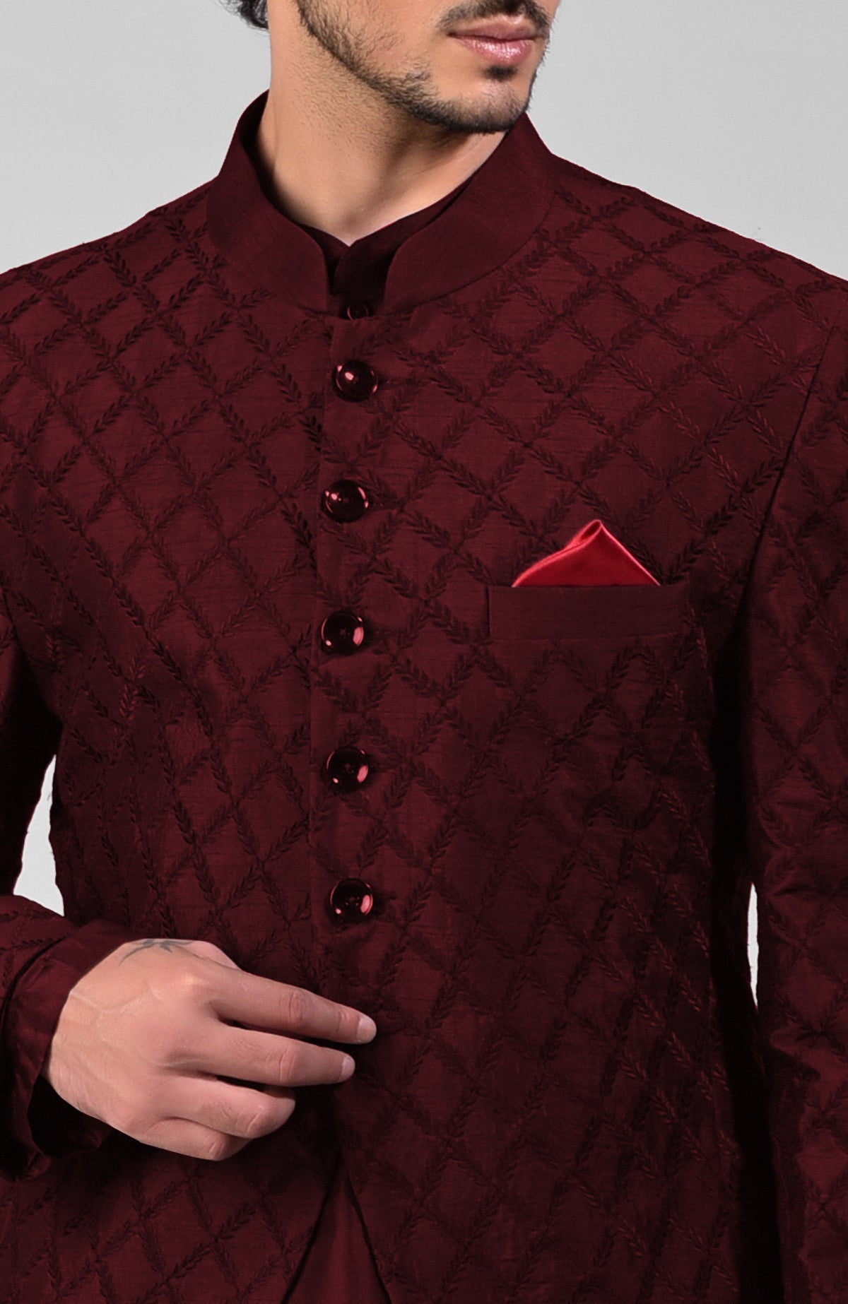 Maroon raw silk bandhgala jacket with geometric floral embroidery all over