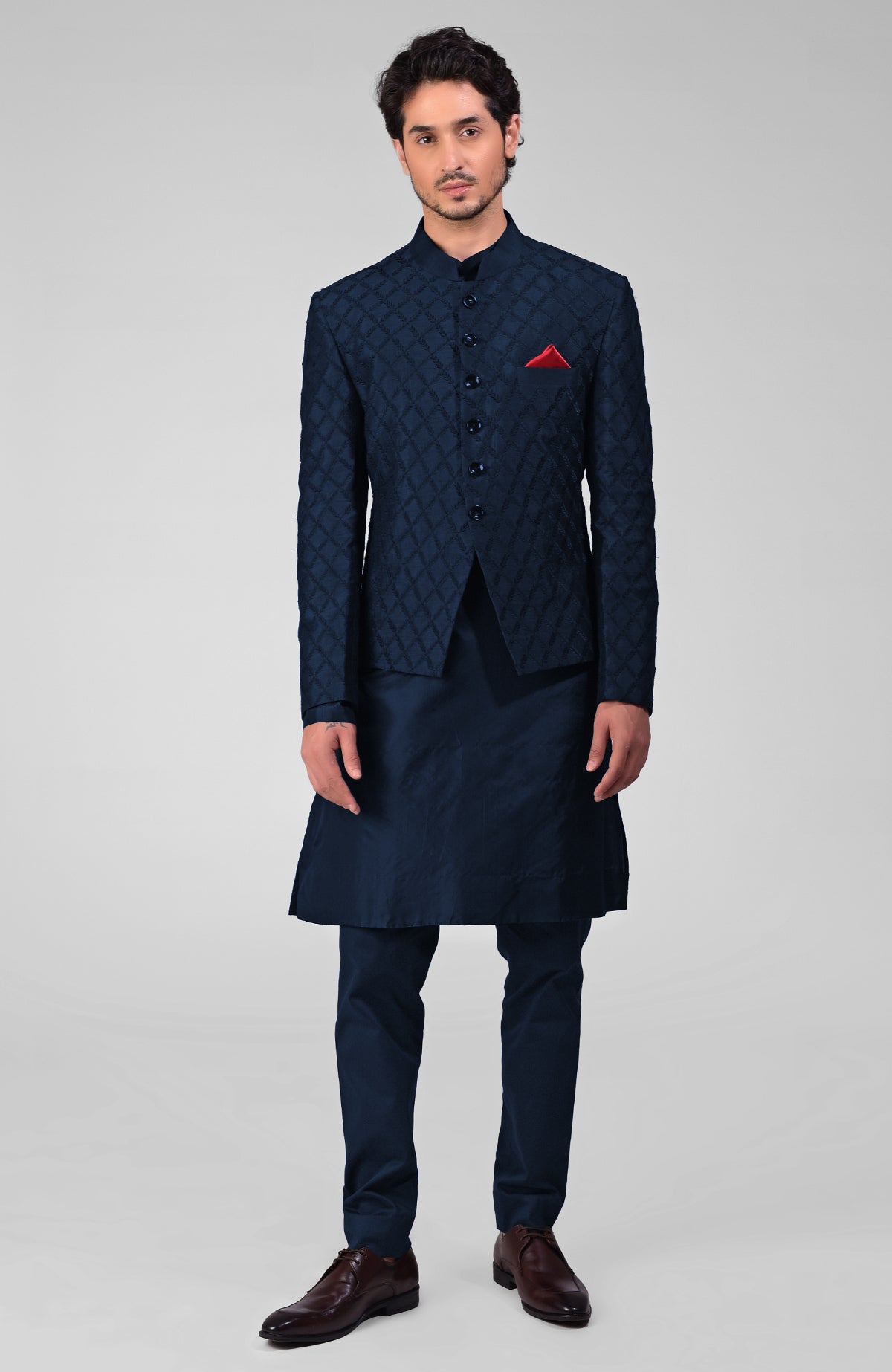Bottle green raw silk bandhgala jacket with geometric floral embroidery all over.