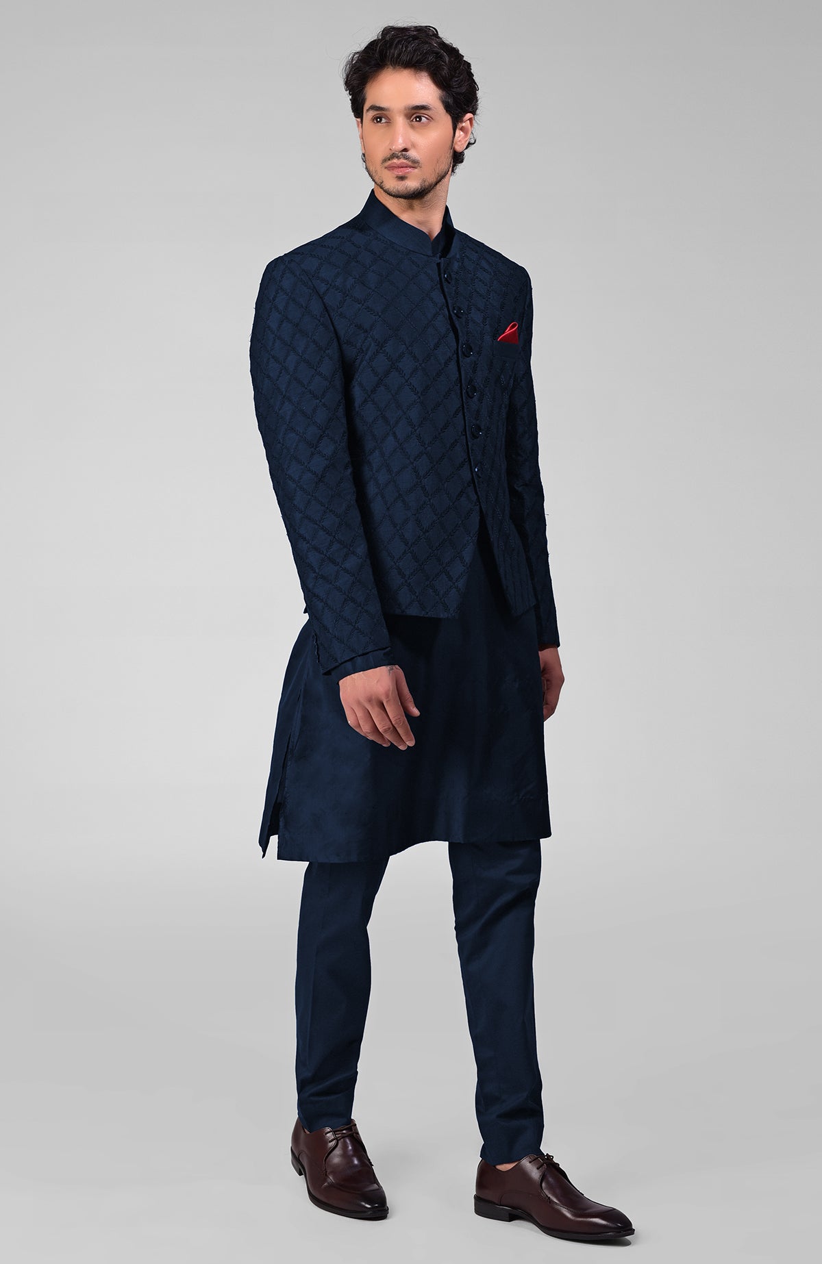 Navy blue raw silk Bandhgala jacket with intricate chikankari floral embroidery in a three-piece set