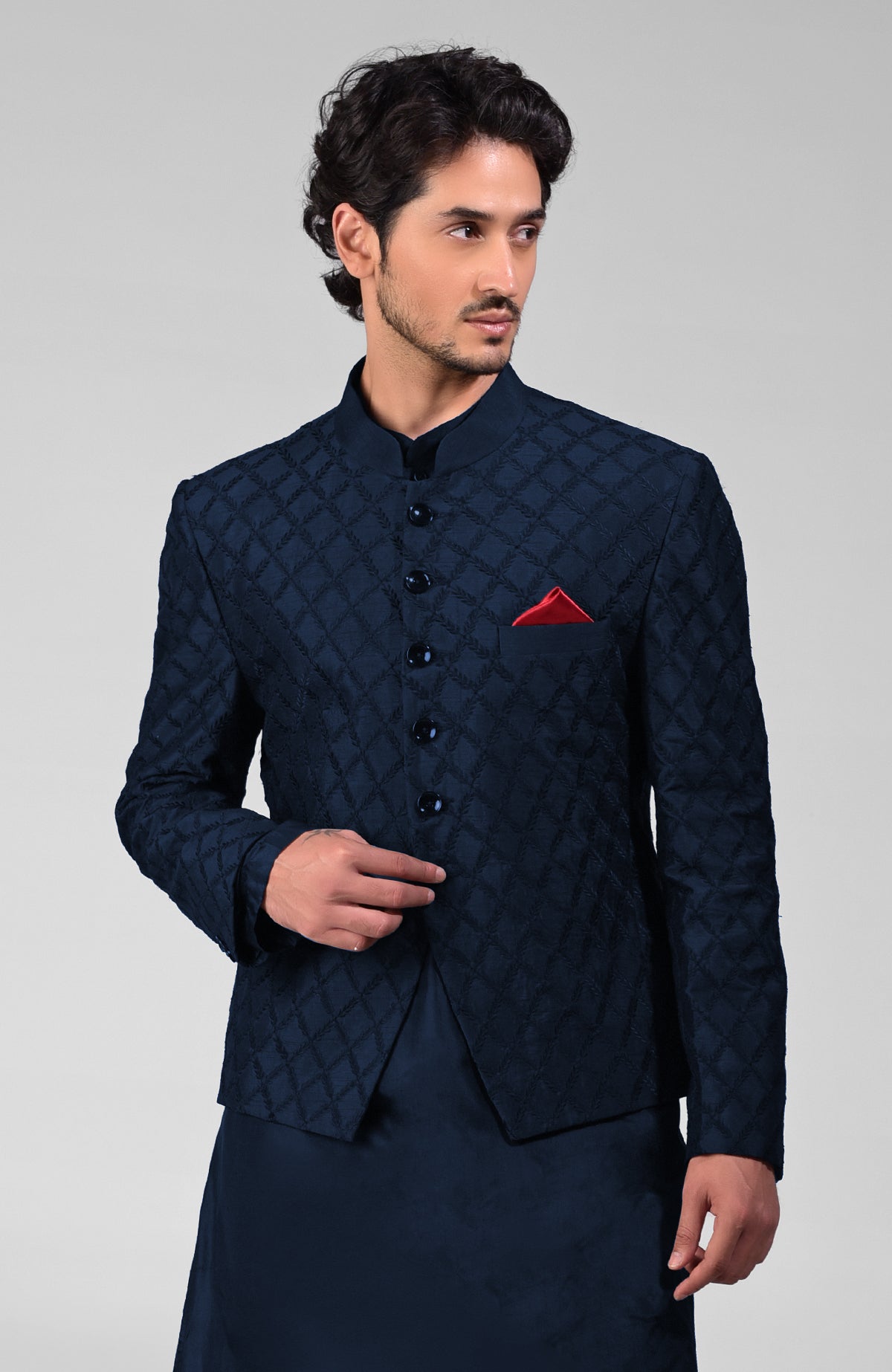 Navy blue raw silk bandhgala jacket with geometric floral embroidery all over.