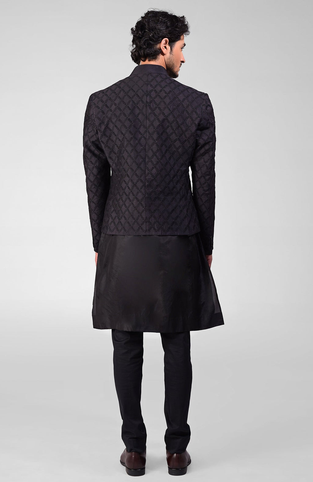 Black silk Bandhgala jacket with intricate chikankari floral embroidery in a three-piece set