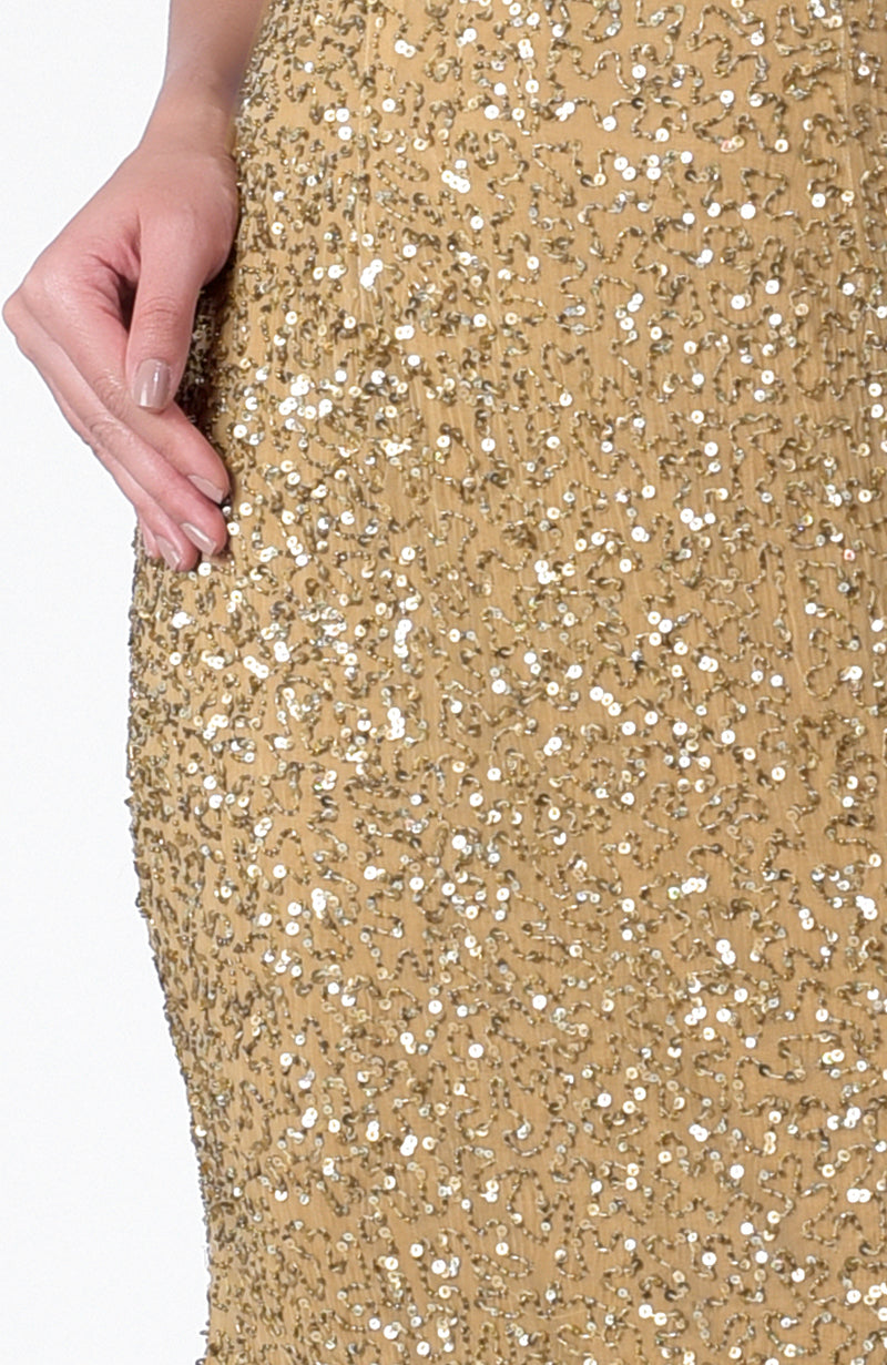 Gold chiffon mermaid gown with hand-embroidered beads, sequins, cowl neck, and open back.