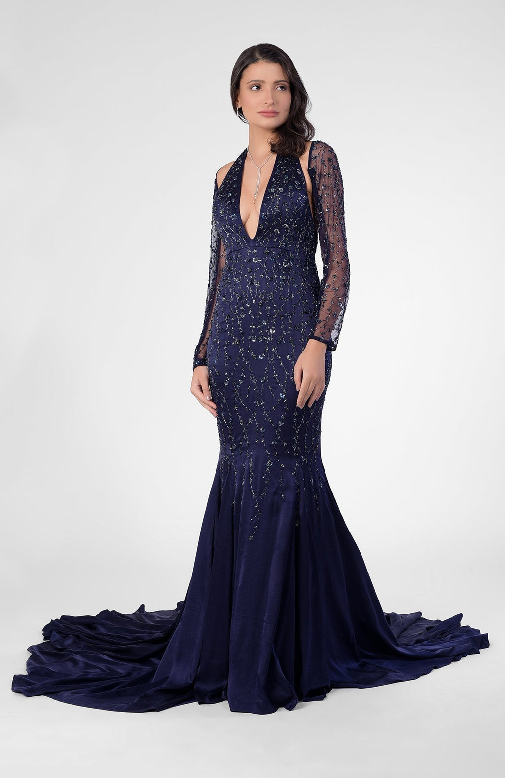 Moonlight mermaid gown with hand embroidery, detachable sheer sleeves, deep V front, and open back.