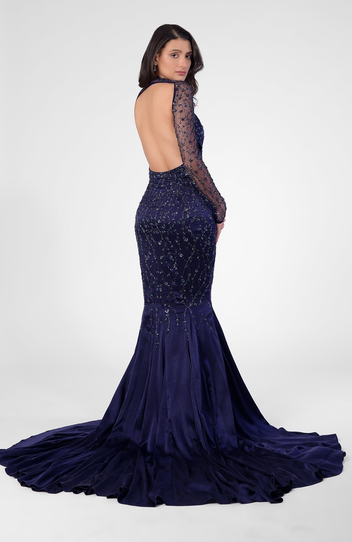 Moonlight mermaid gown with hand embroidery, detachable sheer sleeves, deep V front, and open back.
