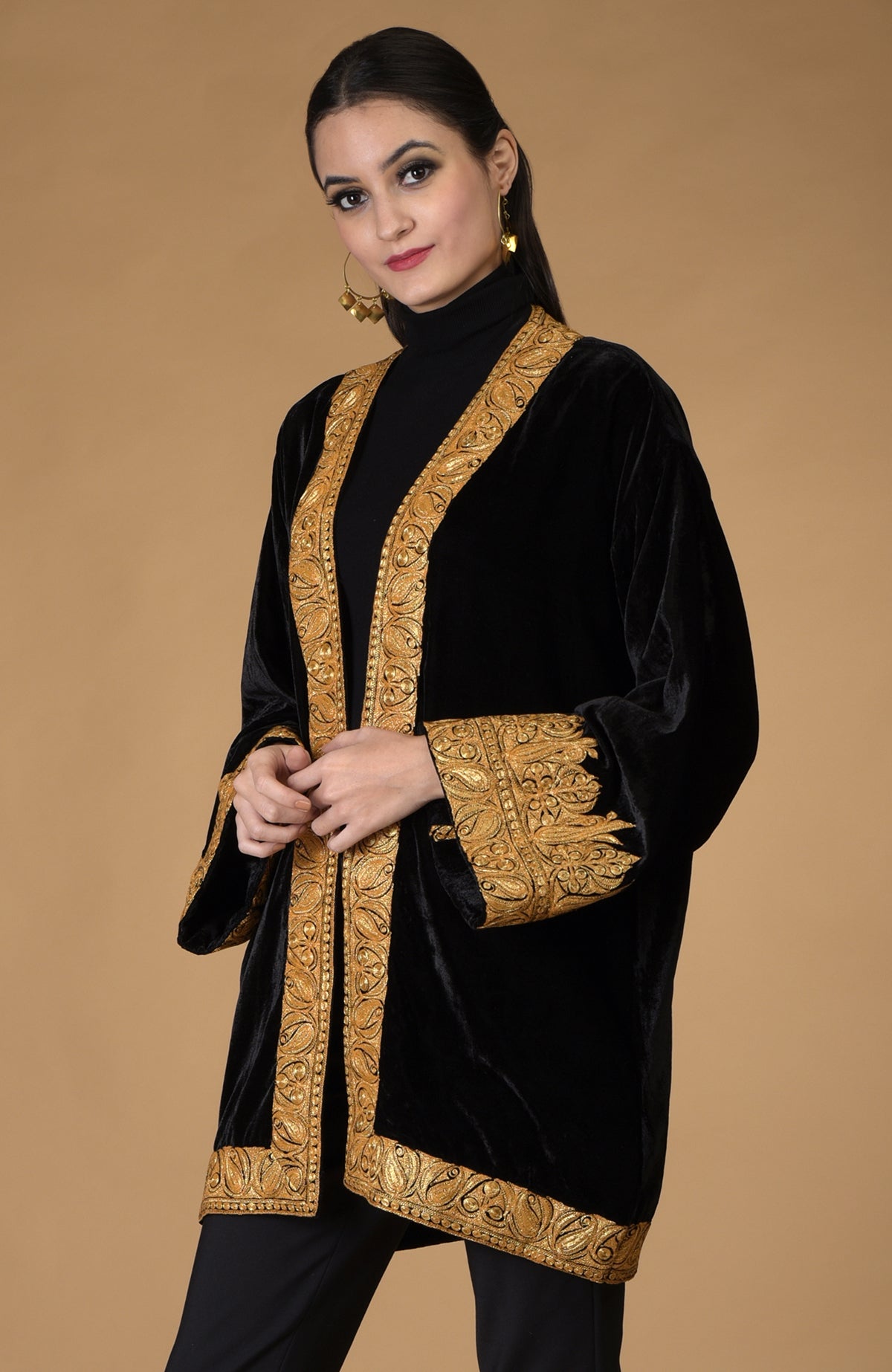 Black velvet kimono jacket with gold Kashmiri tilla embroidery.