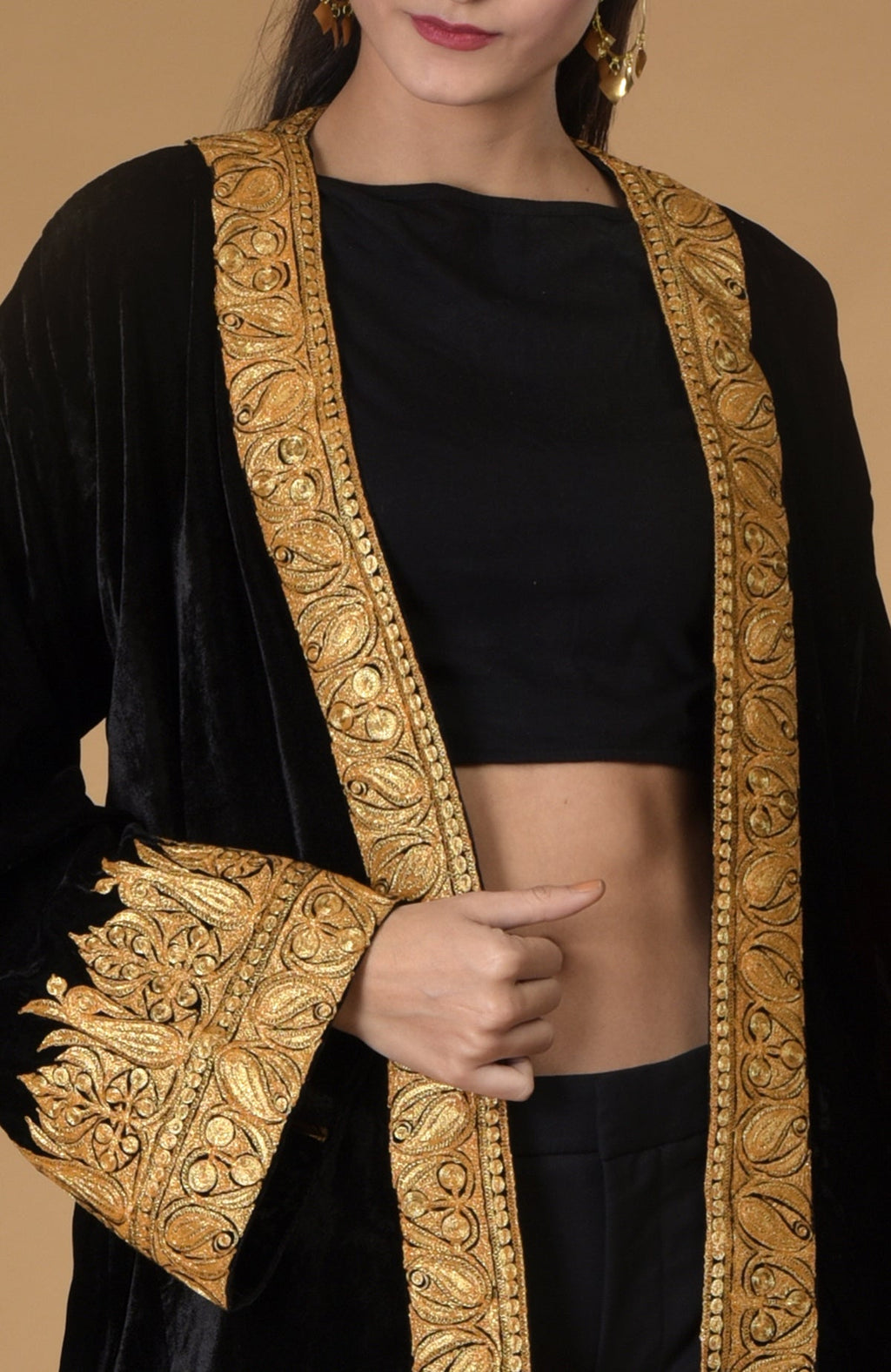 Black velvet kimono jacket with gold Kashmiri tilla embroidery.