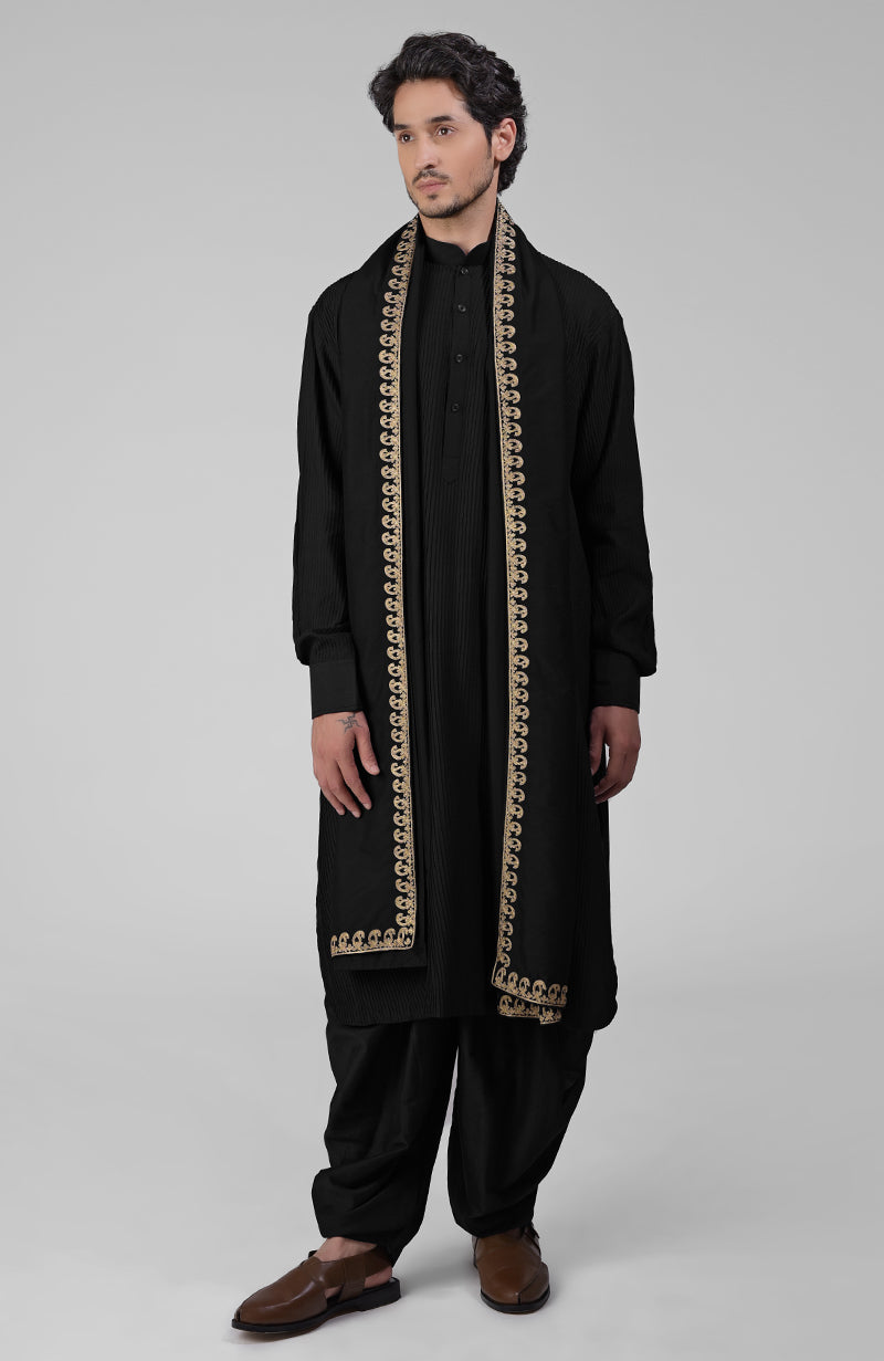 Maroon pintuck Pathani kurta with matching salwar and gold tilla embroidered dupatta.