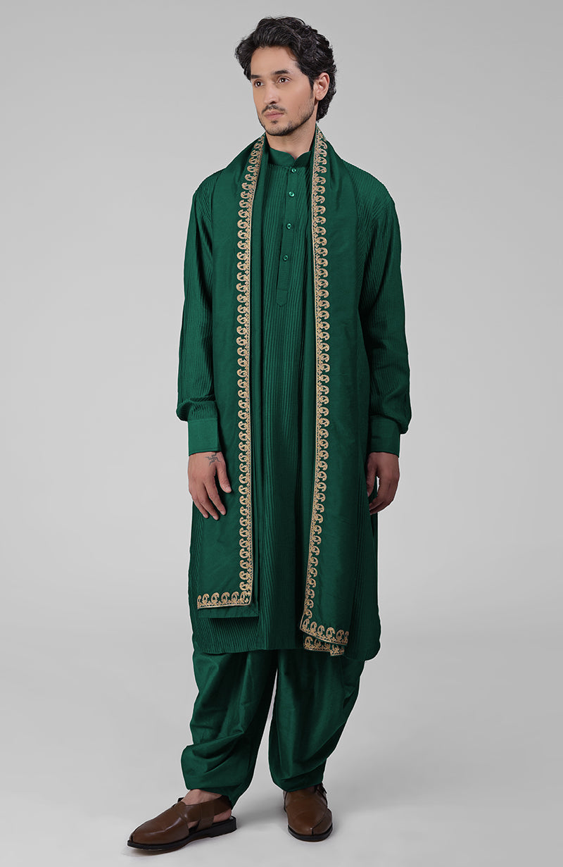 Maroon pintuck Pathani kurta with matching salwar and gold tilla embroidered dupatta.