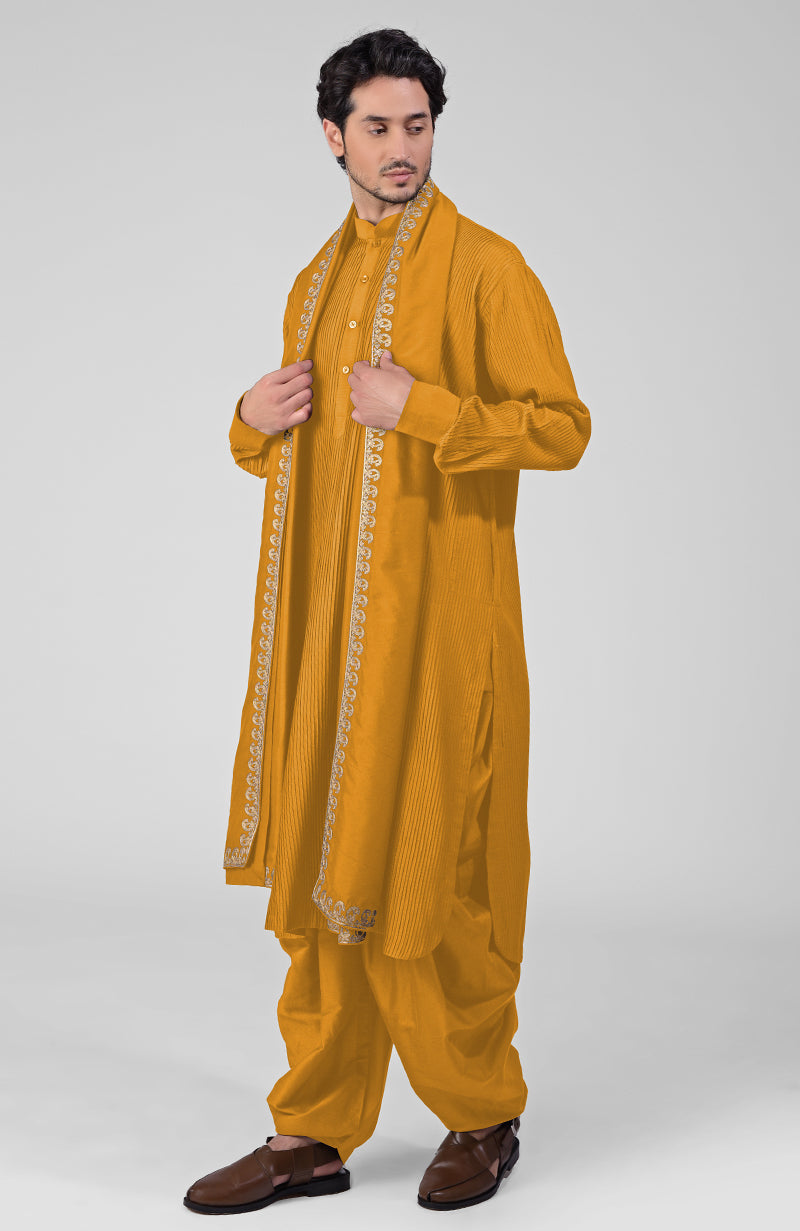 Scarlet red pintuck Kurta with Pathani salwar and gold tilla embroidered dupatta