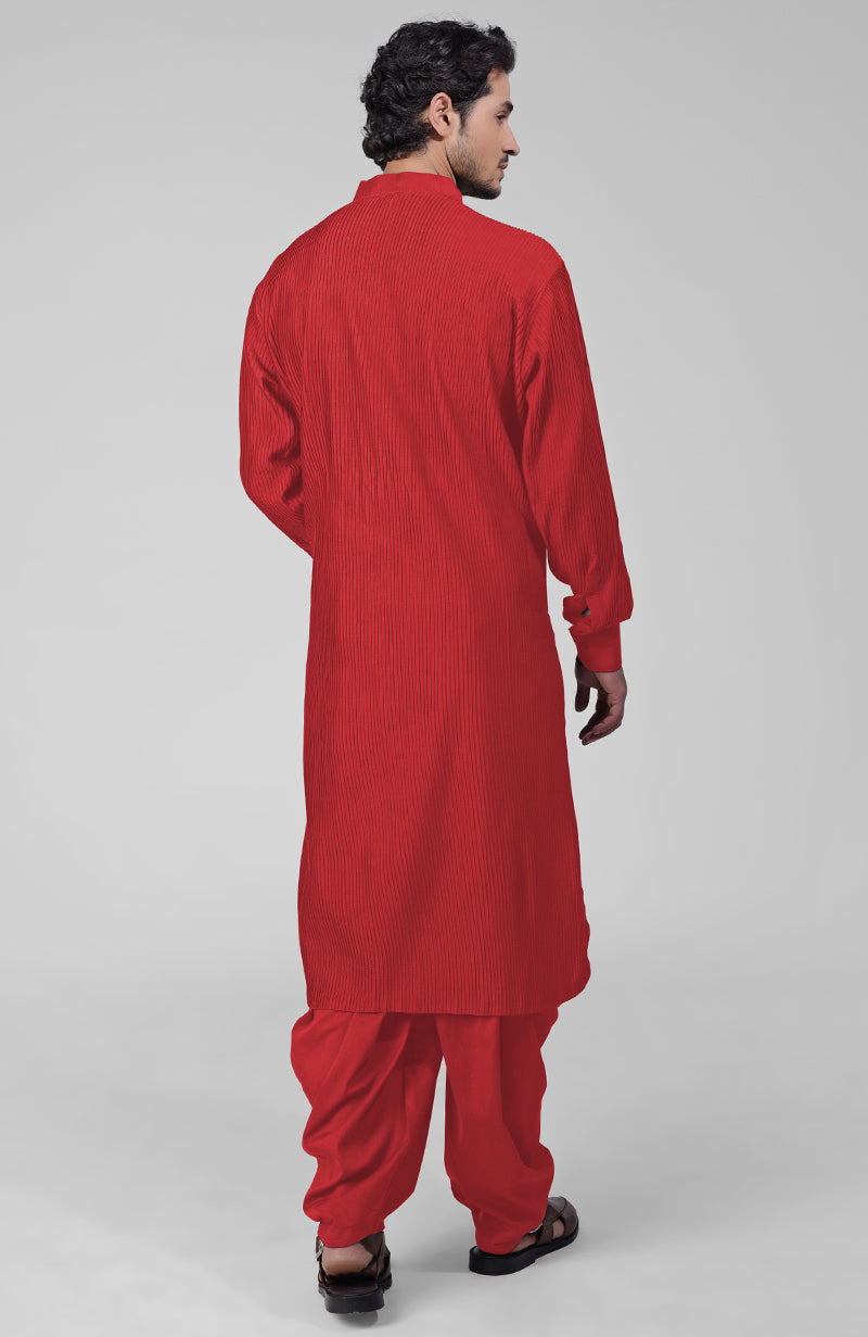 Scarlet red pintuck Kurta with Pathani salwar and gold tilla embroidered Kashmiri dupatta.