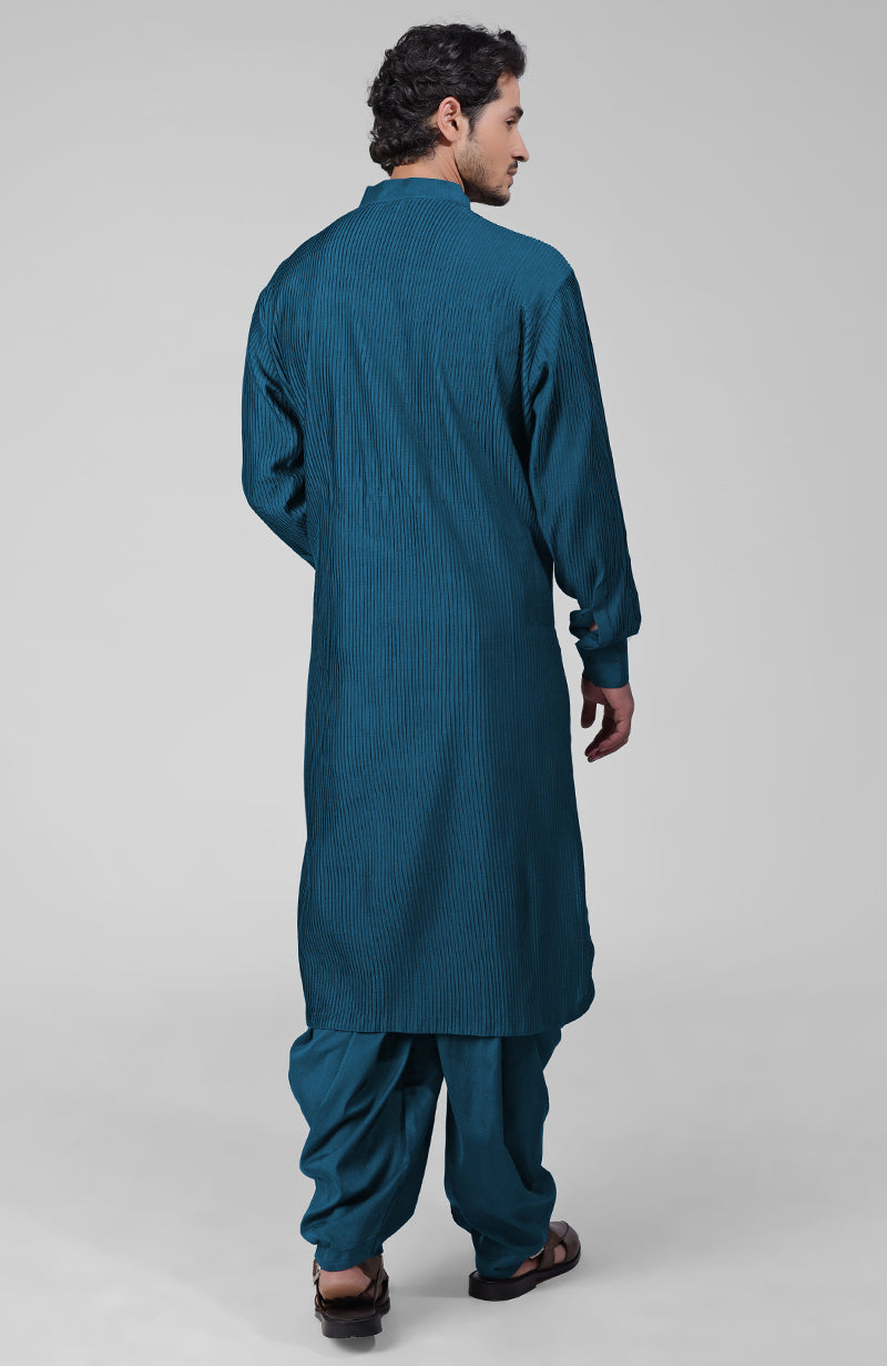 Teal pintuck kurta with pathani salwar and gold tilla embroidered dupatta set.