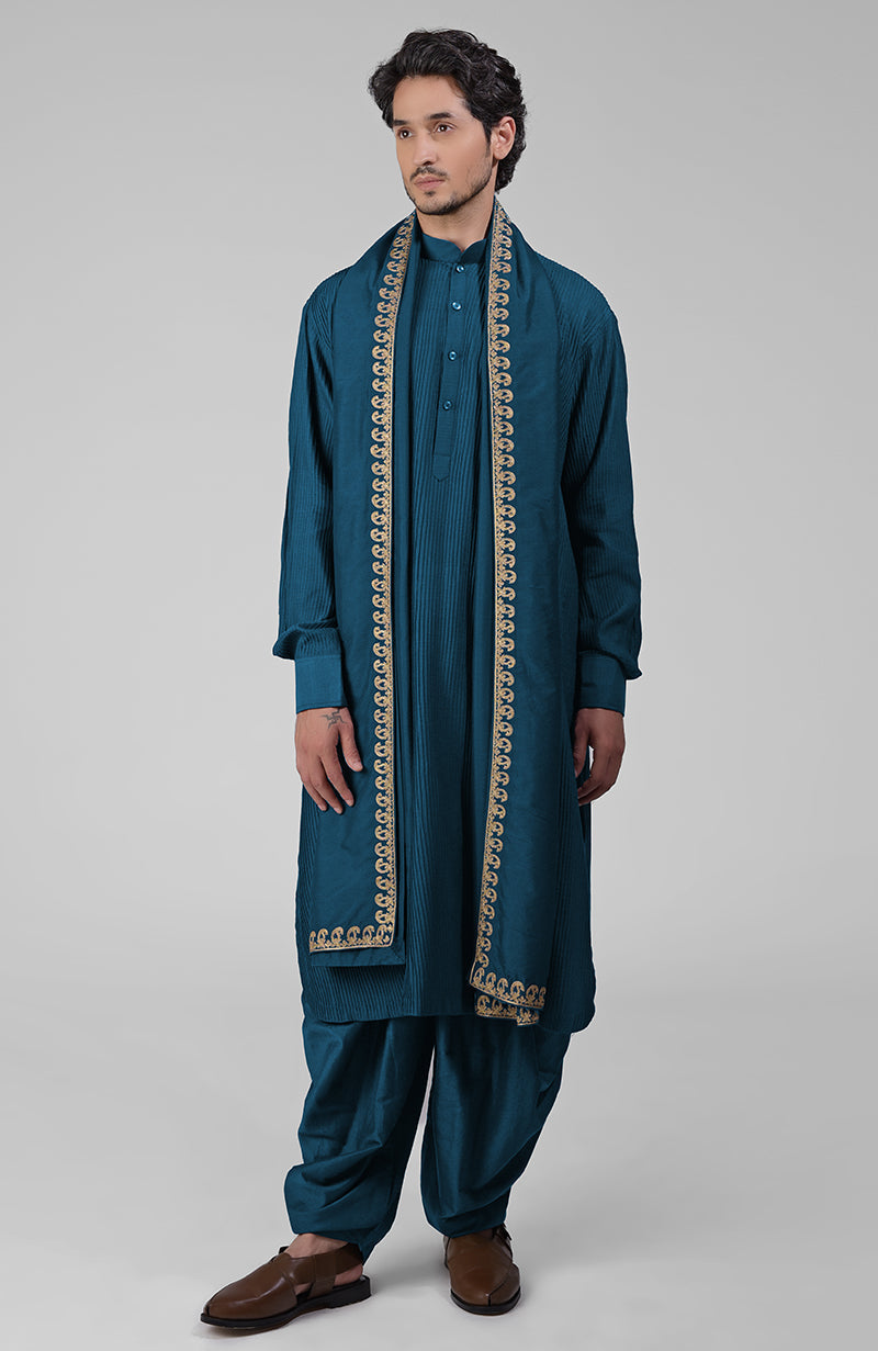 Mustard pintuck Pathani kurta with matching salwar and gold embroidered Kashmiri dupatta.