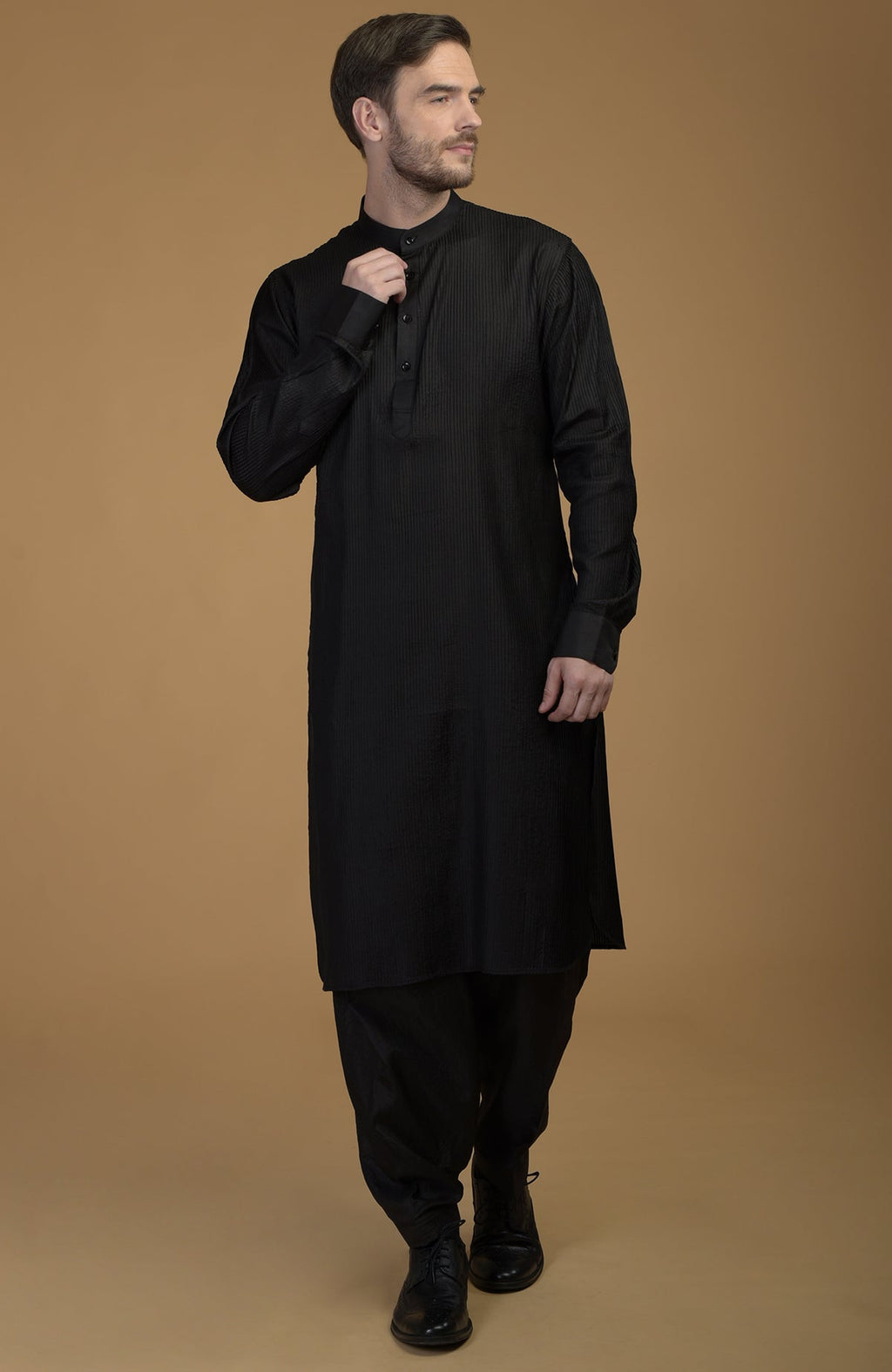 Classic black silk Pathani kurta set with pintuck details.