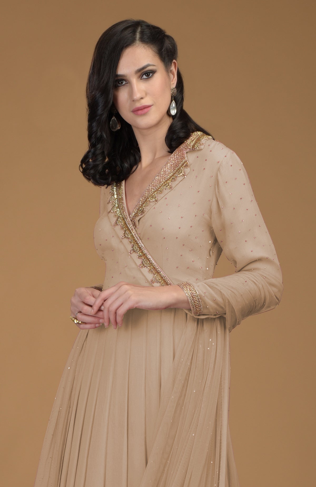 Beige chiffon kalidaar dress with gold zardozi embroidery on bodice, collar, and sleeves