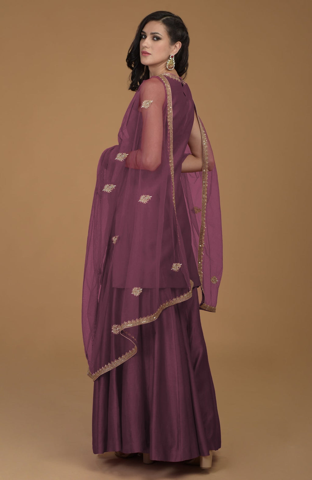 Burgundy purple gharara suit with gold hand-embroidered zardozi on kurta and dupatta
