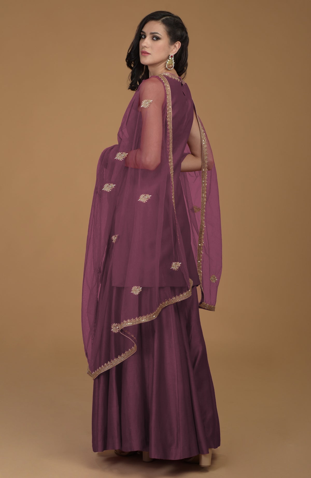 Burgundy purple gharara suit with gold hand-embroidered zardozi on kurta and dupatta