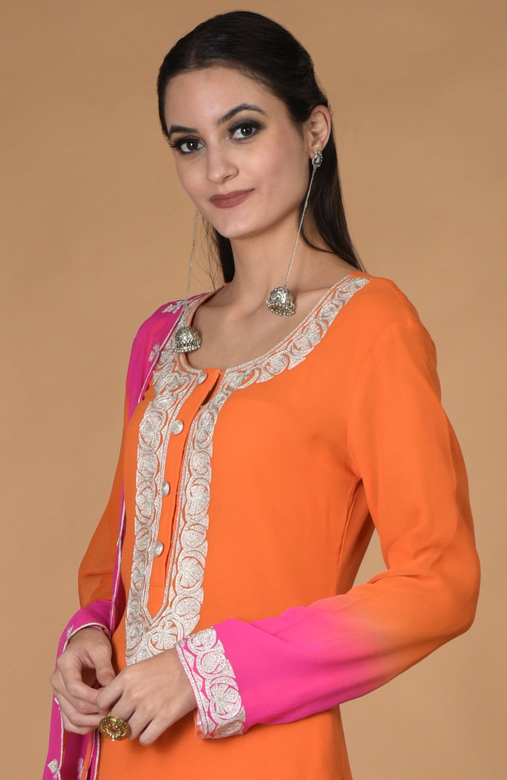 Orange-hot pink ombre tilla embroidered kurta set with silver earrings.