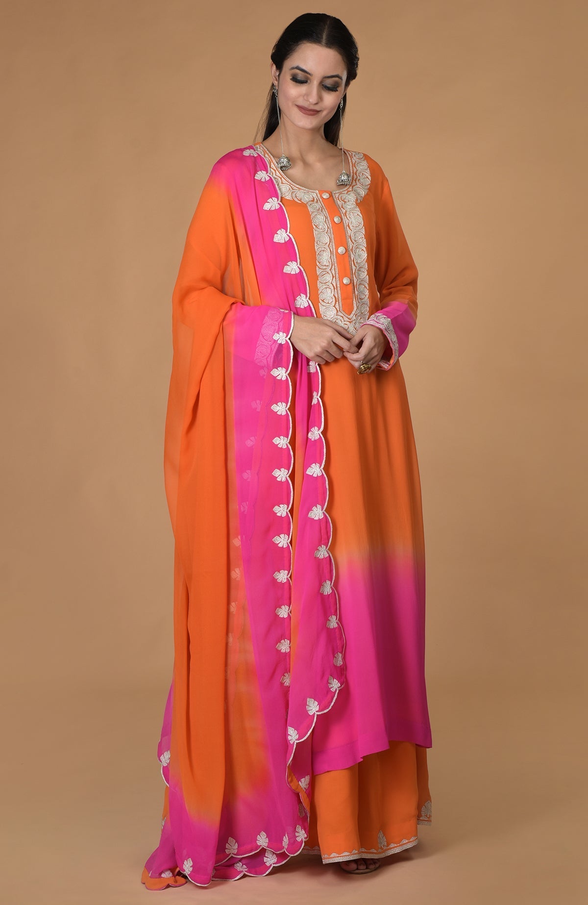 Orange-hot pink ombre kurta set with tilla embroidery and matching dupatta.