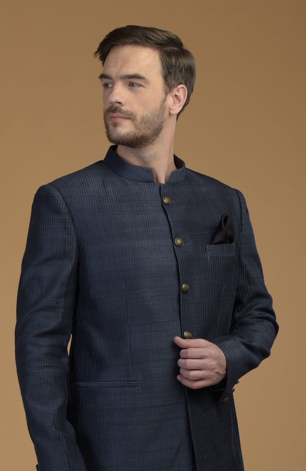 Orion Blue Pintuck Raw Silk Bandhgala Jacket with a black pocket square.