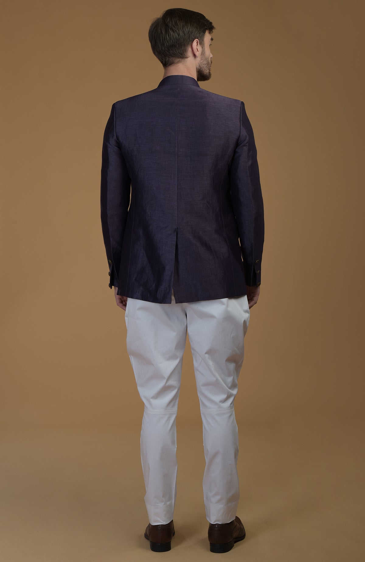 Eclipse Blue Linen Silk Bandhgala Jacket, shown from the back, paired with white pants.