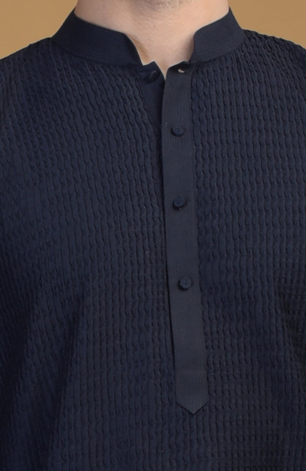 Dark navy kurta with pintuck and Kantha detail, featuring a band collar.