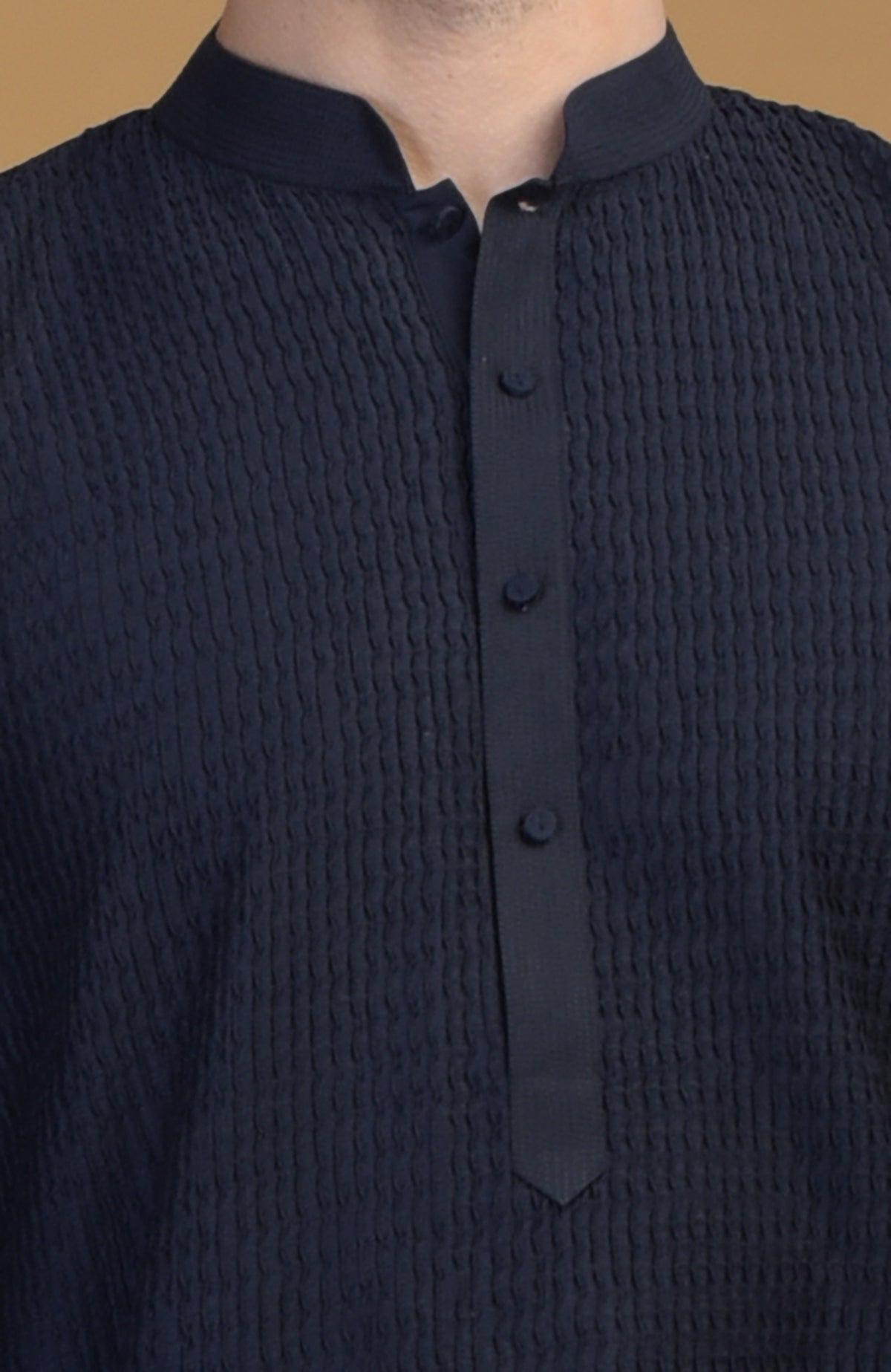 Dark navy kurta with pintuck and Kantha detail, featuring a band collar.