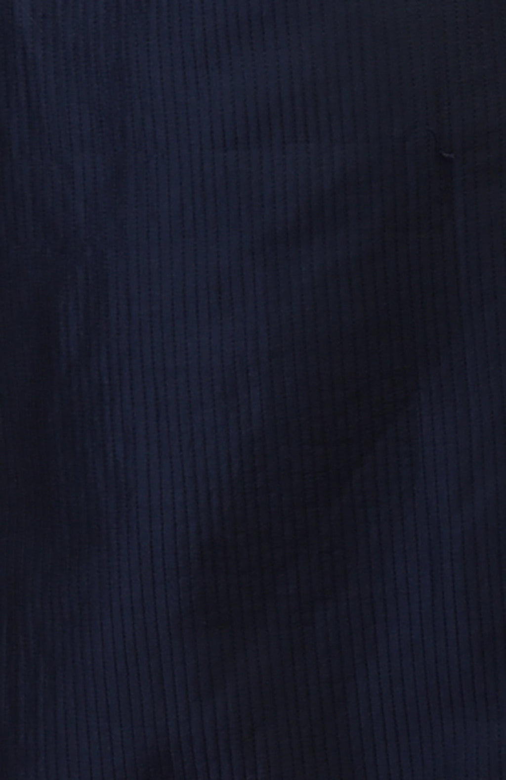 Dark navy kurta with vertical pintuck stitching and subtle kantha detail.