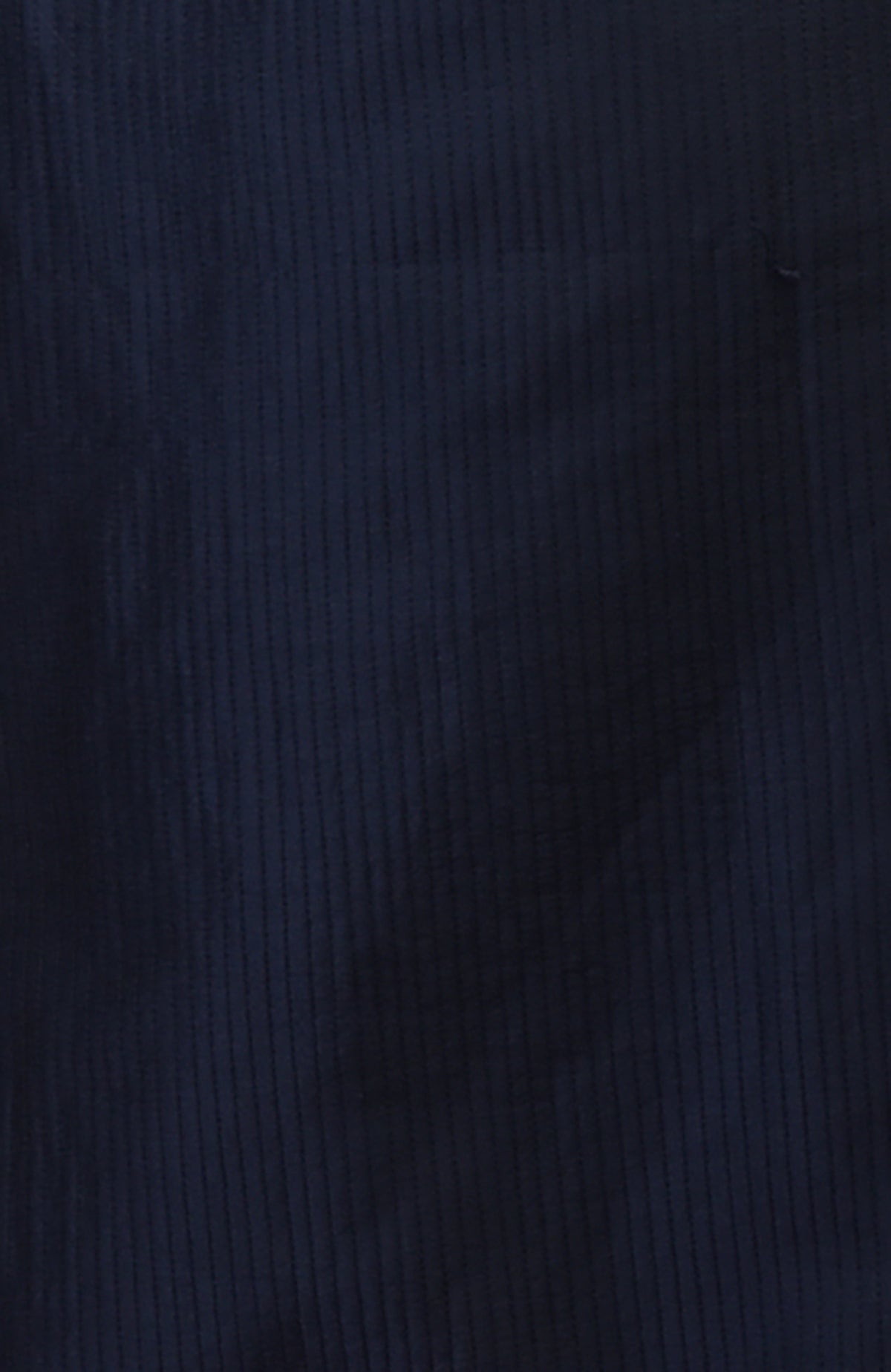 Dark navy kurta with vertical pintuck stitching and subtle kantha detail.