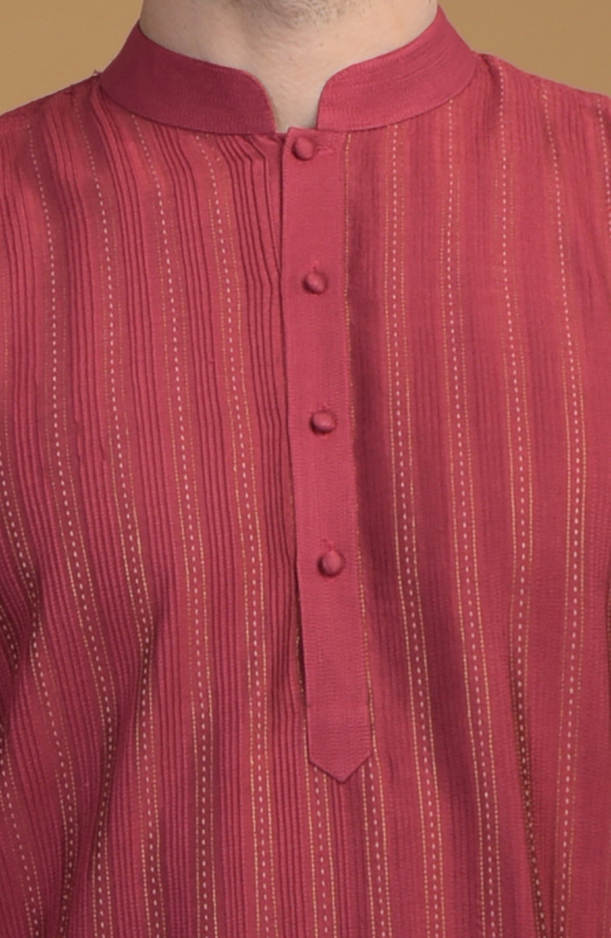 Wine kurta with pintuck and kantha details.