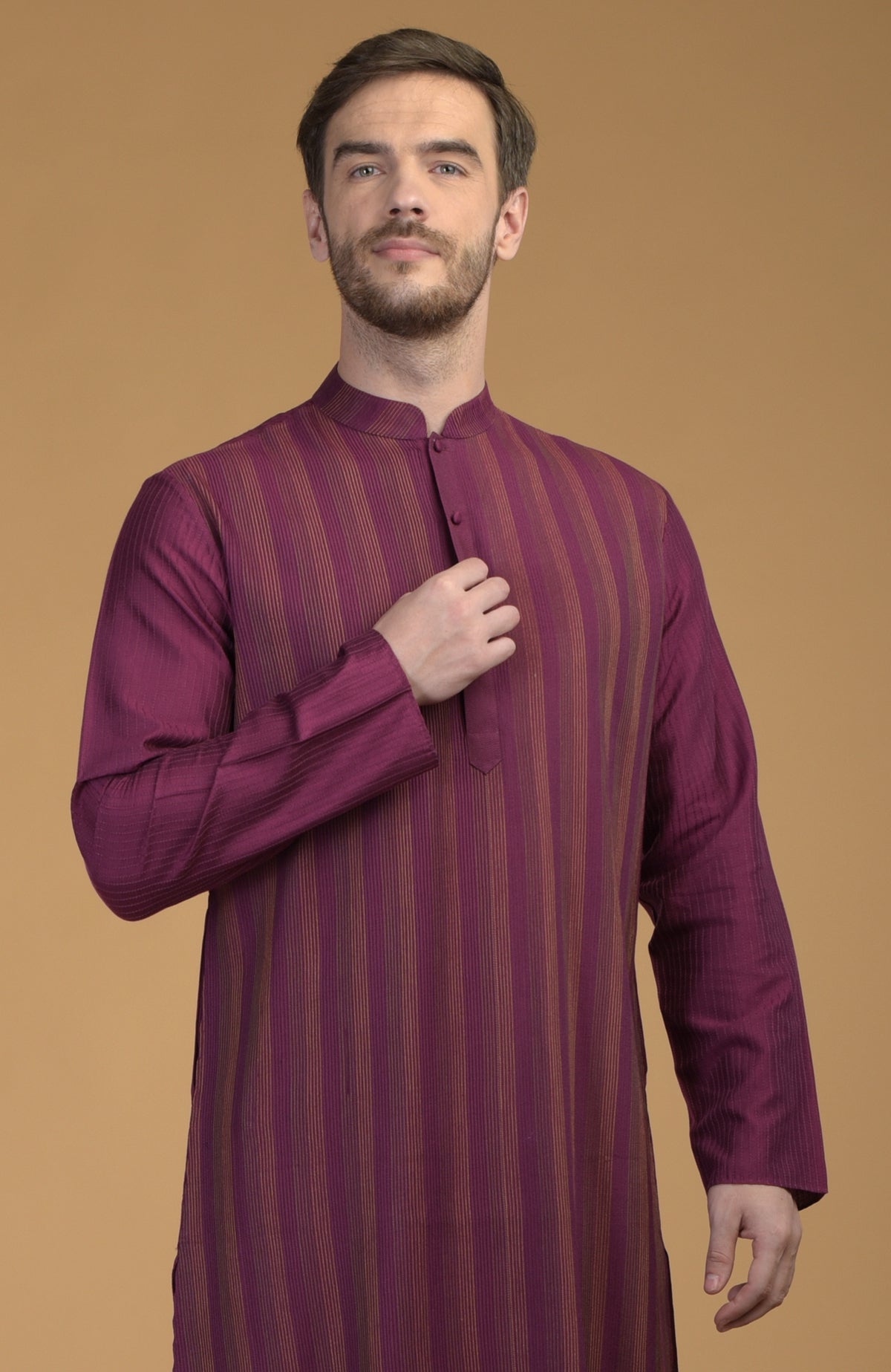 Plum kurta with pintuck and kantha detail.