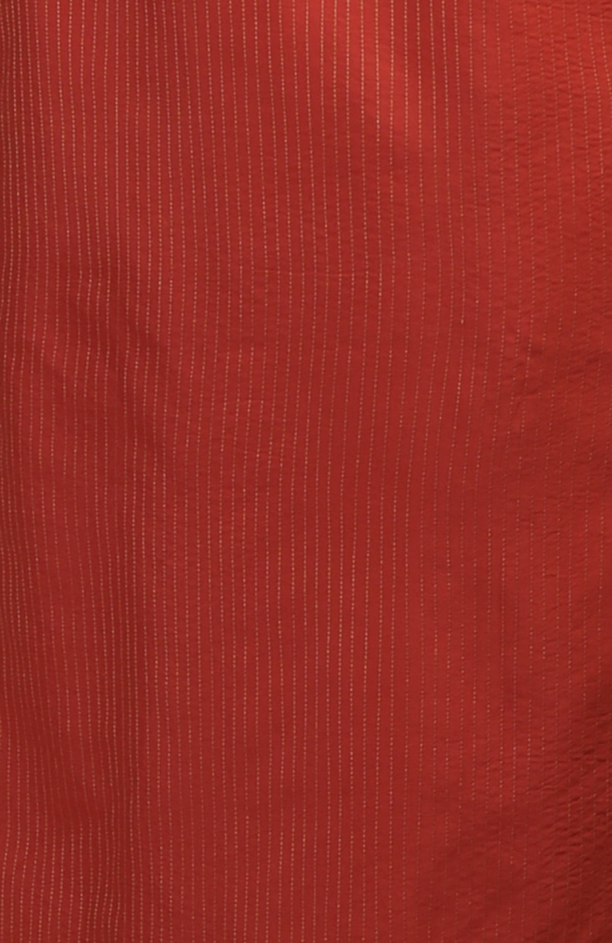 Seinna Kurta in a rich red color with vertical pintuck and Kantha stitch details.