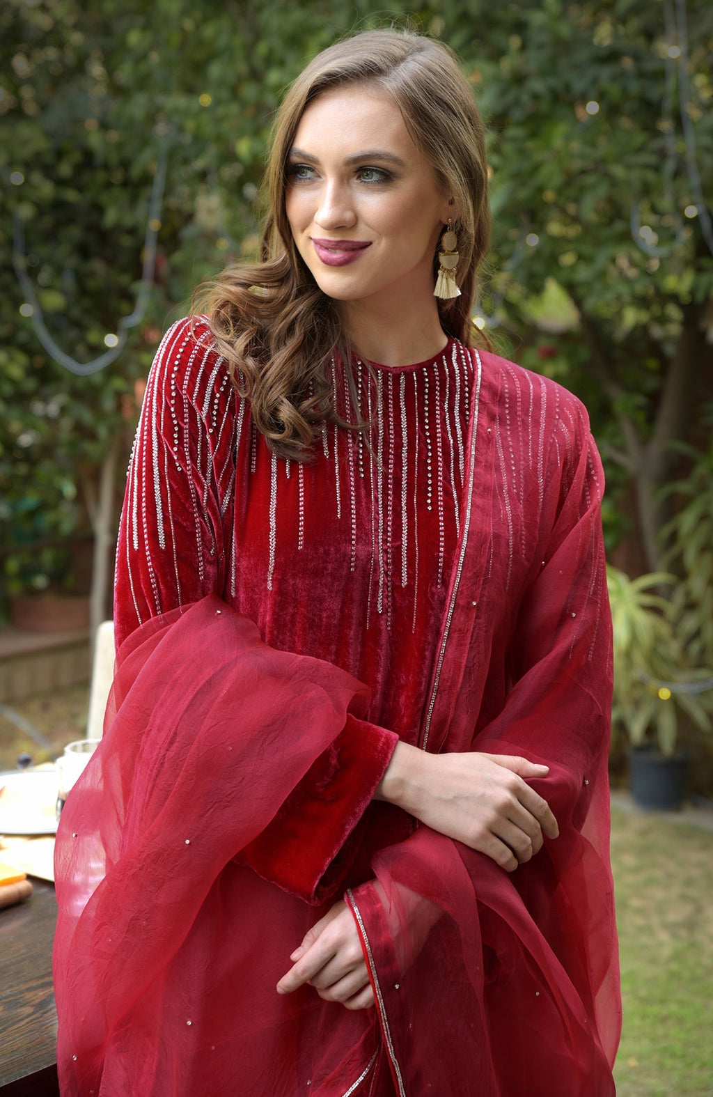 Cherry red velvet kurta set with crystal and bead embroidery.