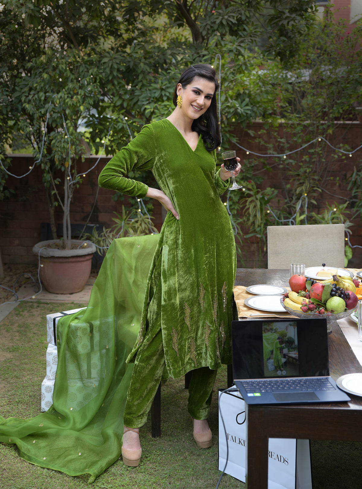 Pepper Stem Green velvet kurta set with gilded beads and sequin embroidery.